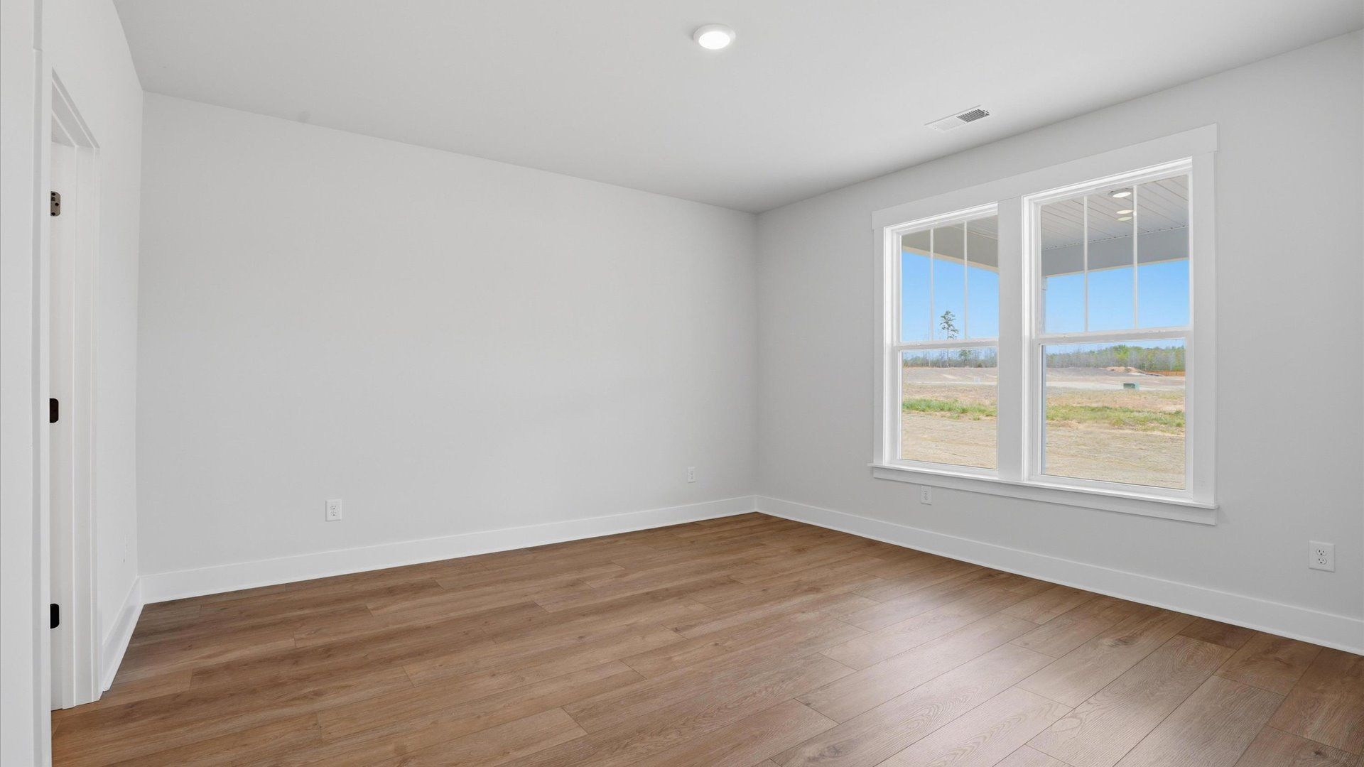 Spacious and serene primary suite with thoughtful design in a desirable DRB Homes community