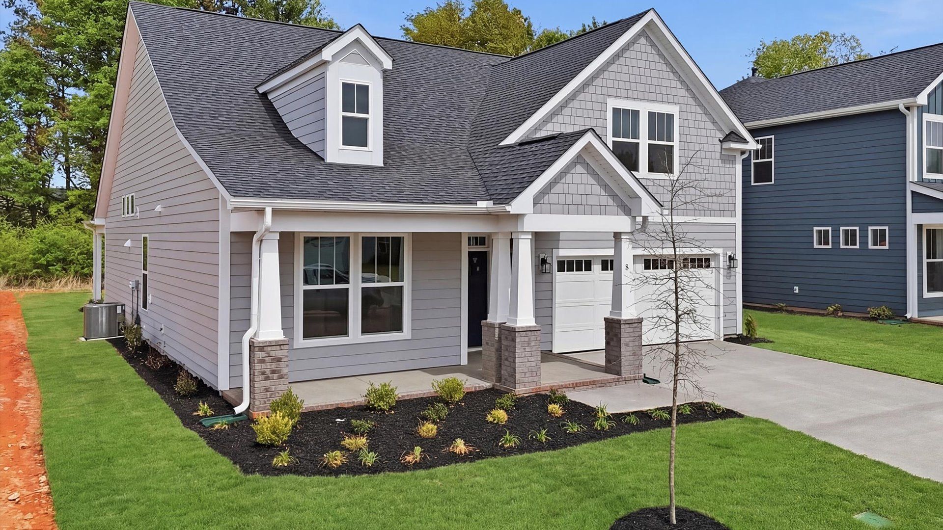 Exceptional home with tasteful exterior finishes and a thoughtfully designed façade located in Greenville, SC
