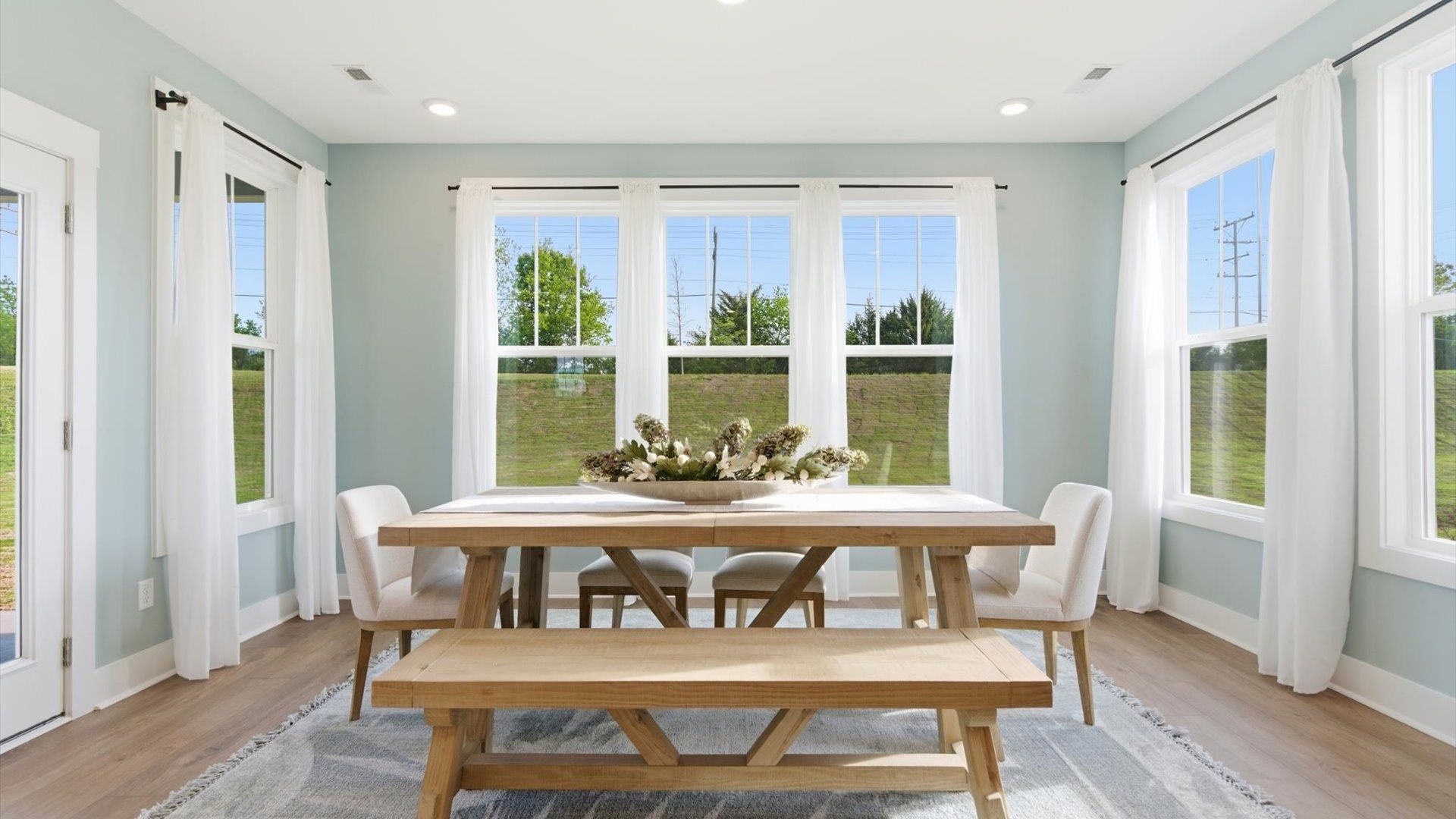 Vibrant and bright breakfast area in an exceptional single family home by DRB Homes