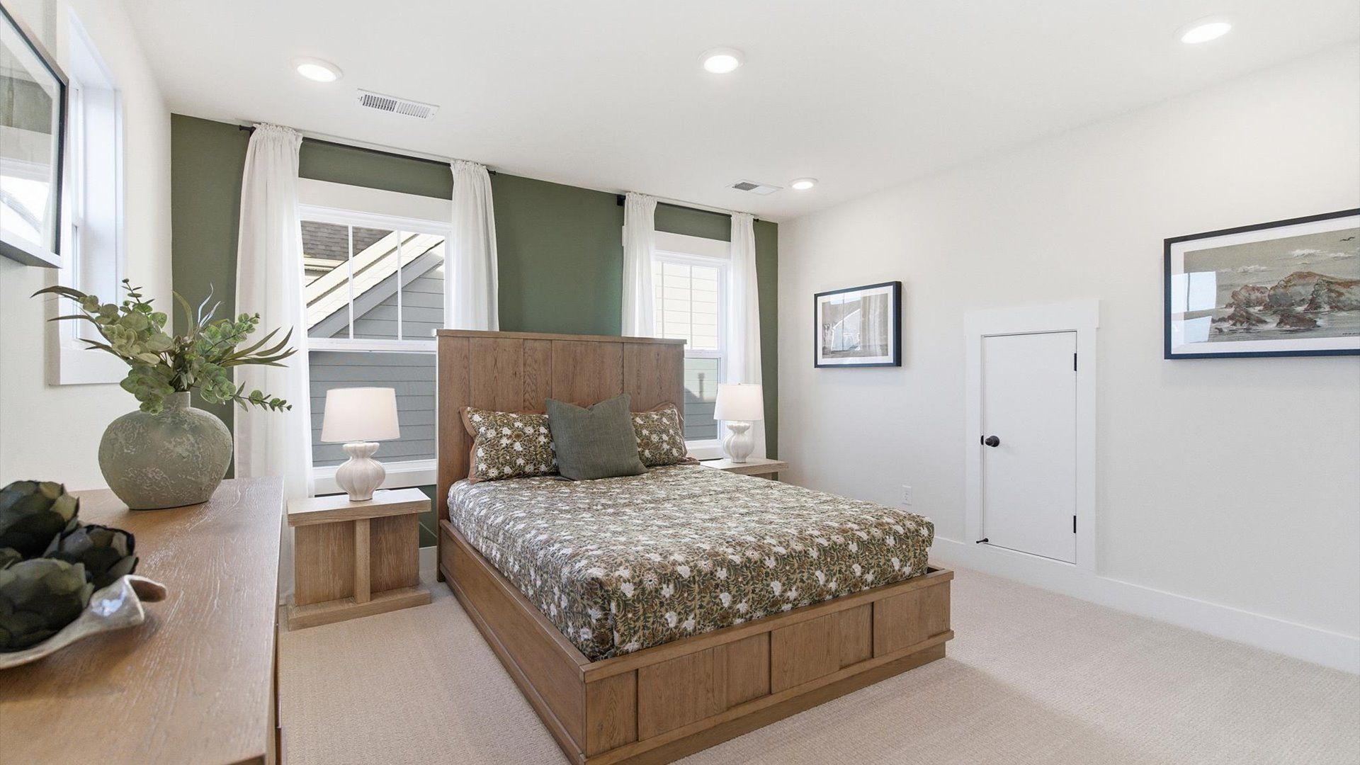 Notable secondary bedroom offering cozy carpeted flooring and a stylish walk-in closet located at Benjamin's Grove