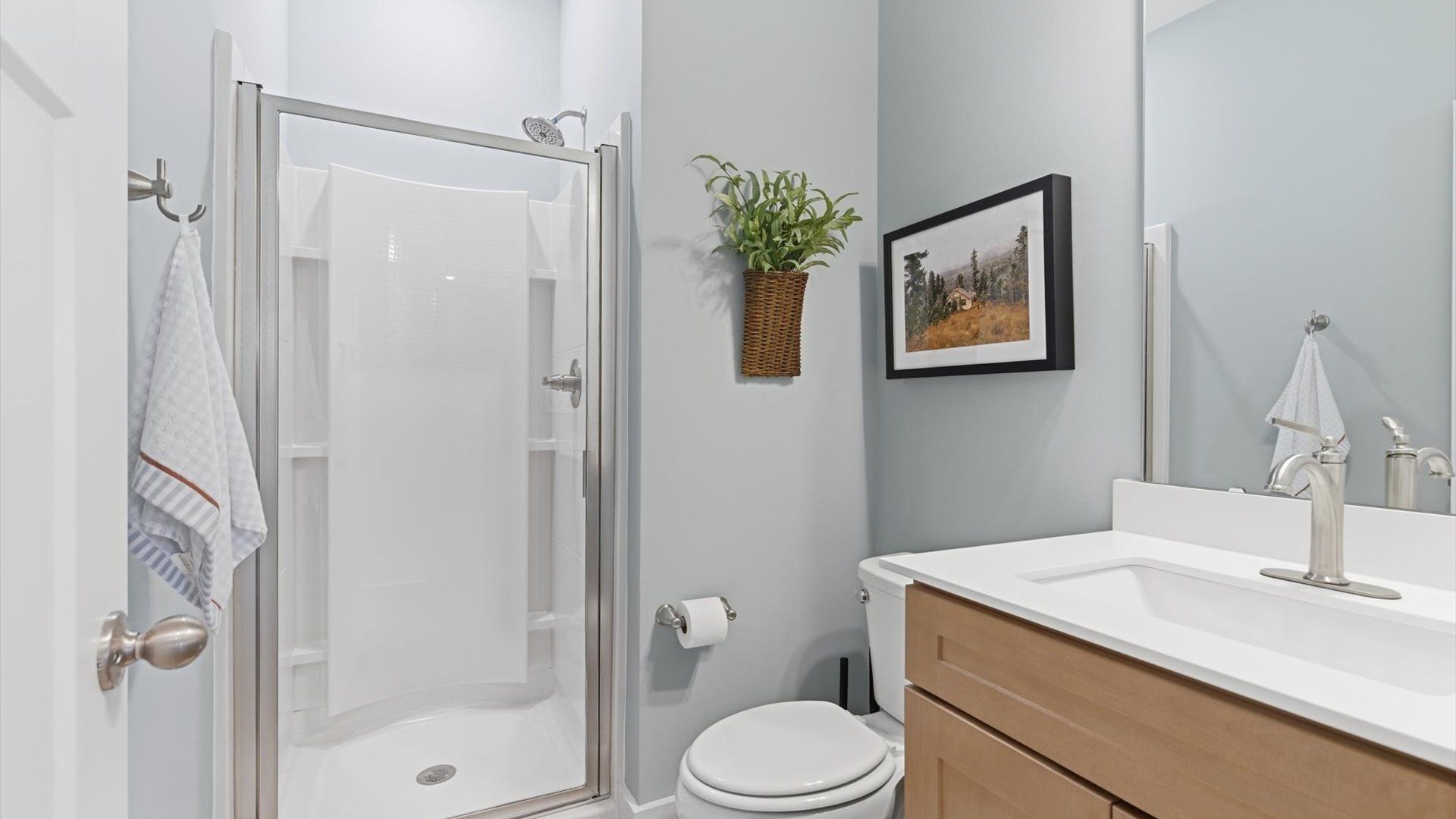 Stylish guest bathroom with superior design and thoughtful storage solutions