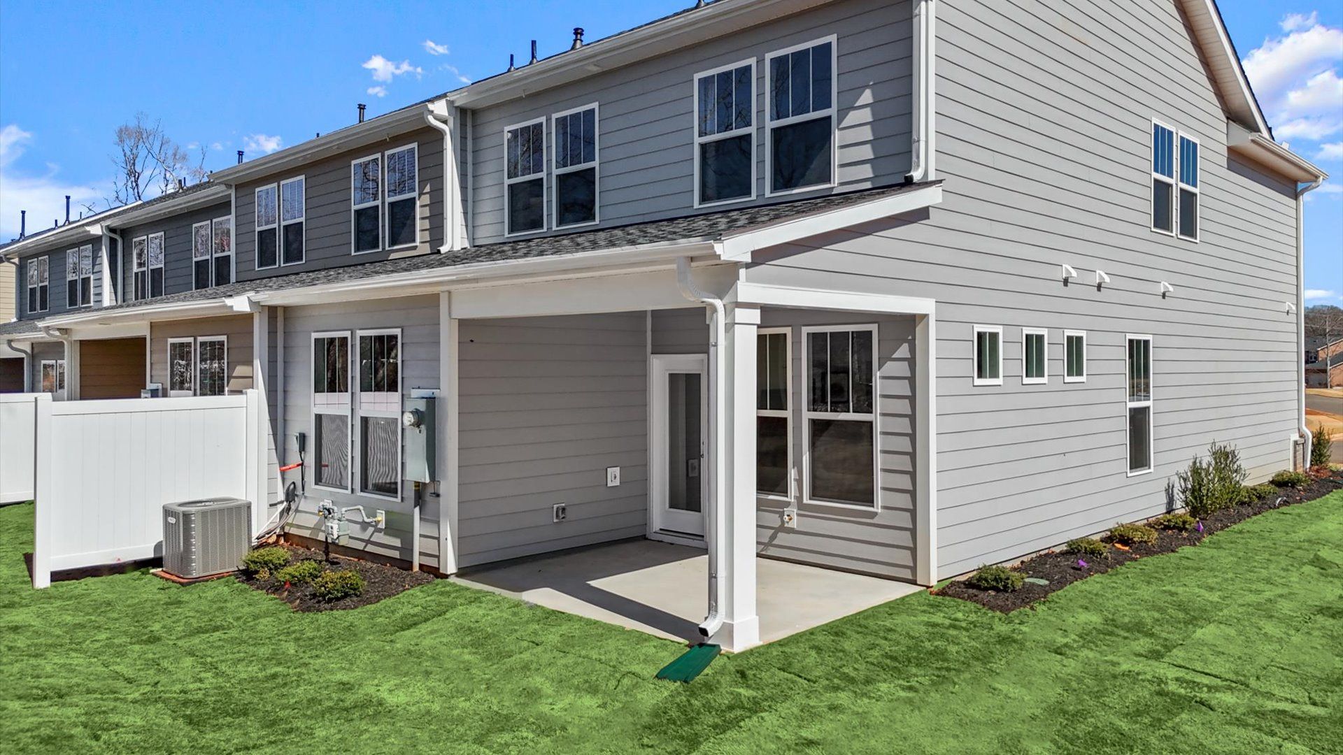 Exclusive rear covered porch with accomplished detail and elevated outdoor living potential of the Lawson design