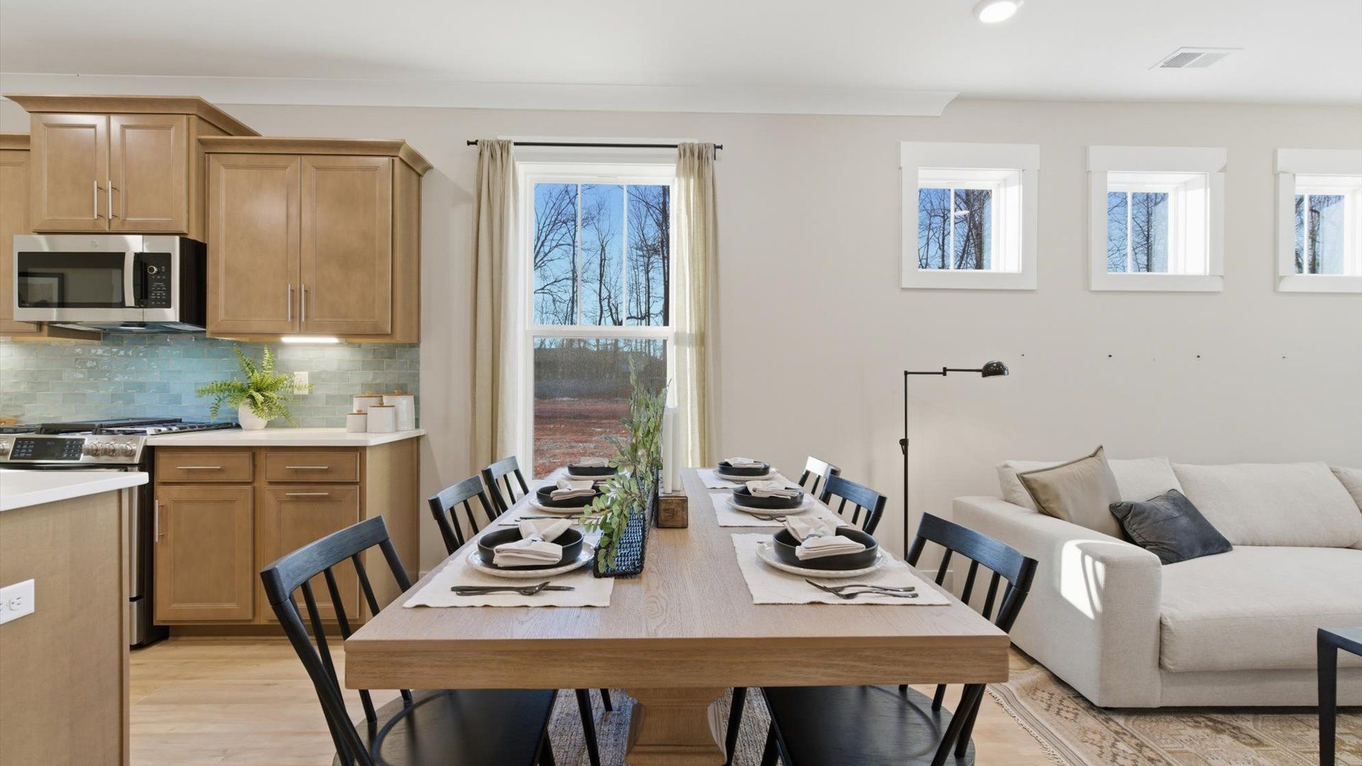 Established charm meets modern elegance in this first-rate dining area by DRB Homes located at Pelham Crossing