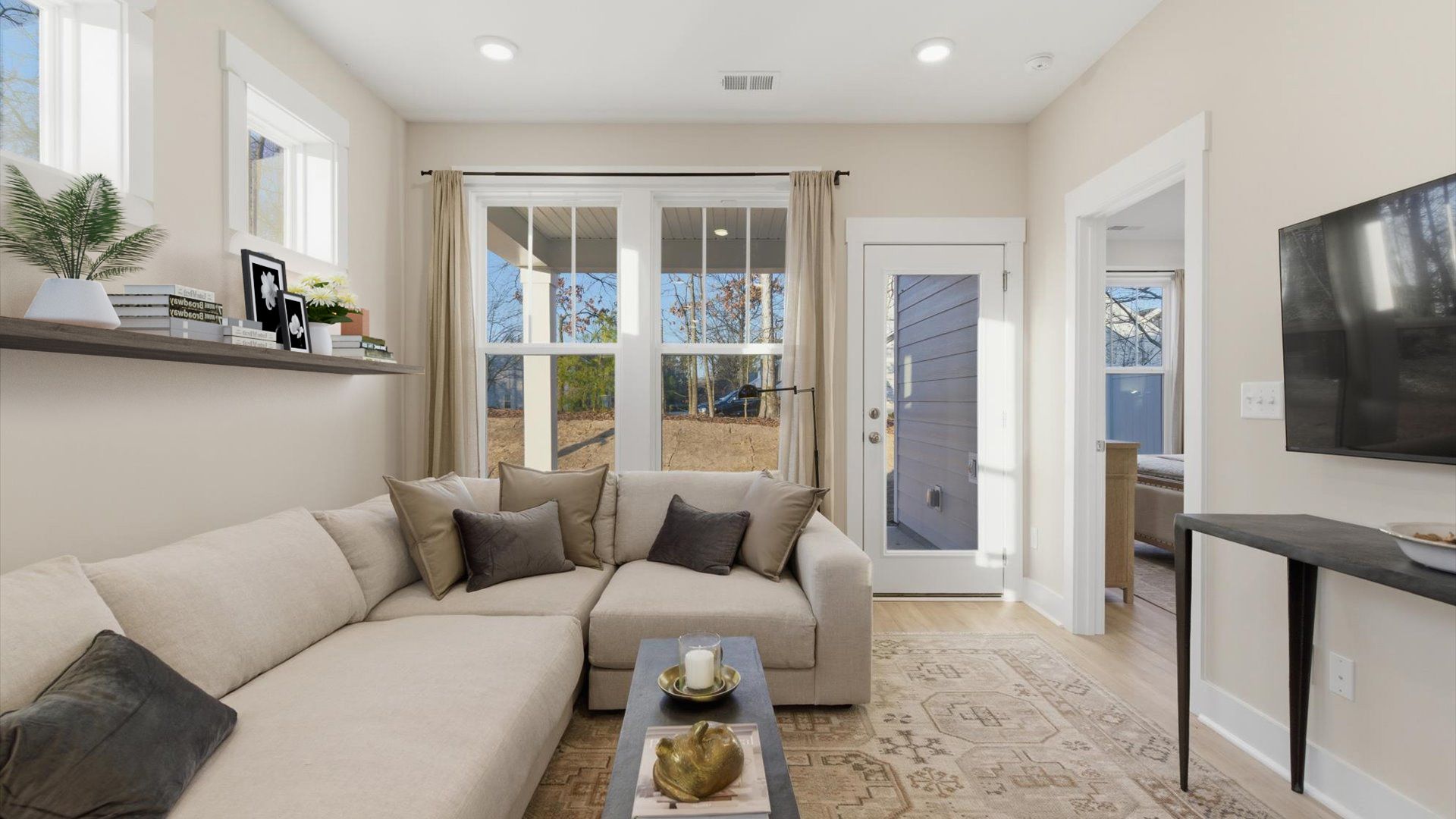 First-class family room of the Lawson Design offering comfort and style with an elegant balance of space and detail in SC