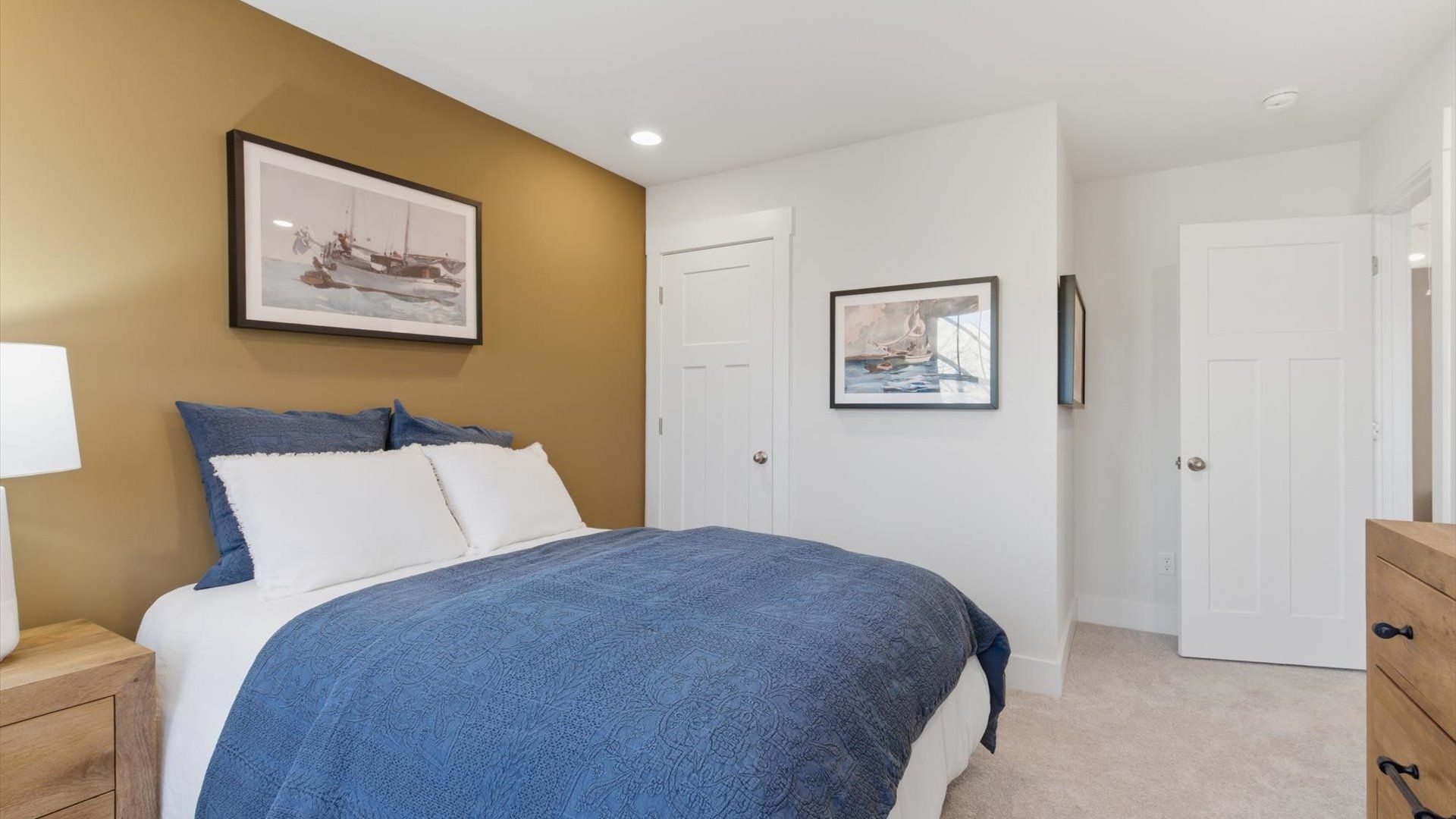 Superior comfort in a secondary bedroom with plush carpet and an oversized walk-in closet at Pelham Crossing