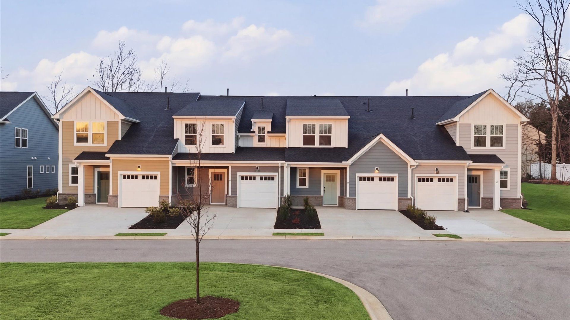 Notable street presence with tasteful elevation and thoughtful landscaping at the Pelham Crossing Villas