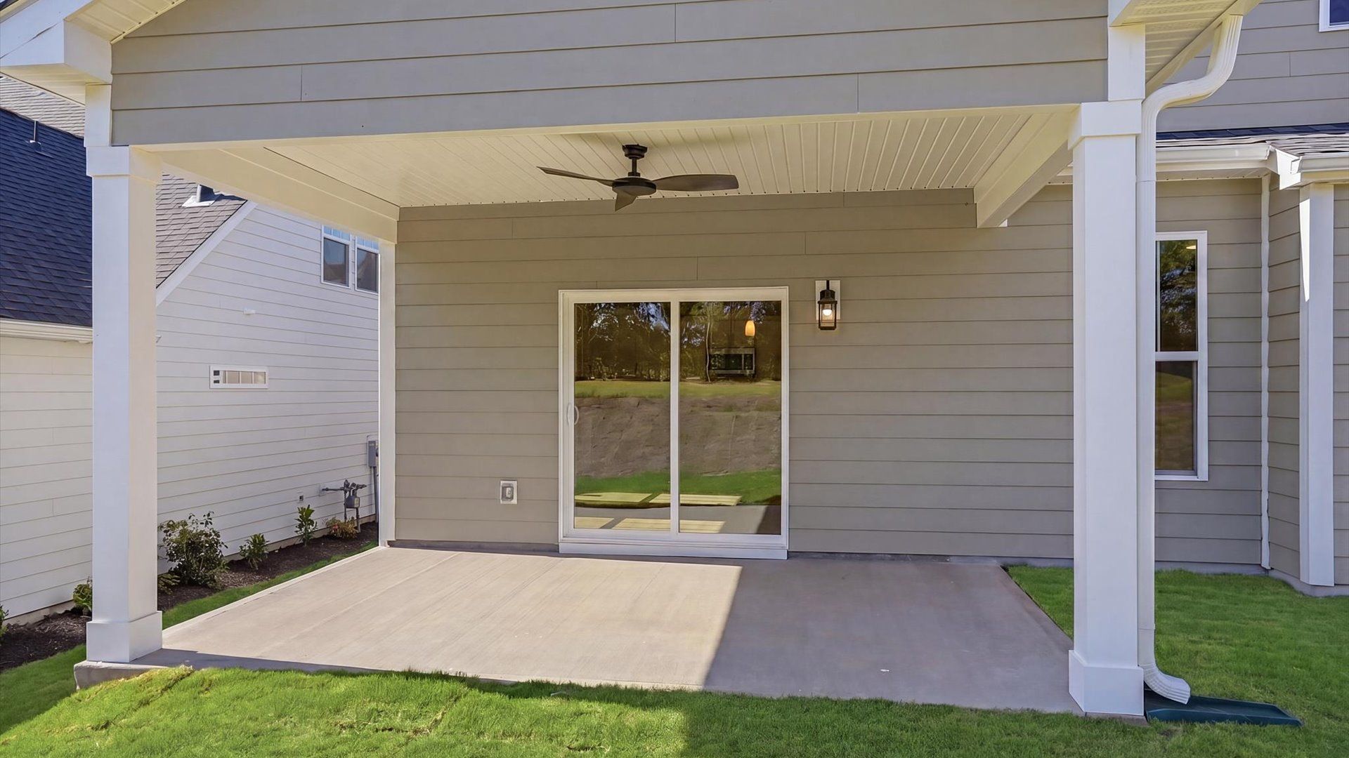 Established charm meets functional outdoor living with a spacious rear covered porch located in Woodruff, SC