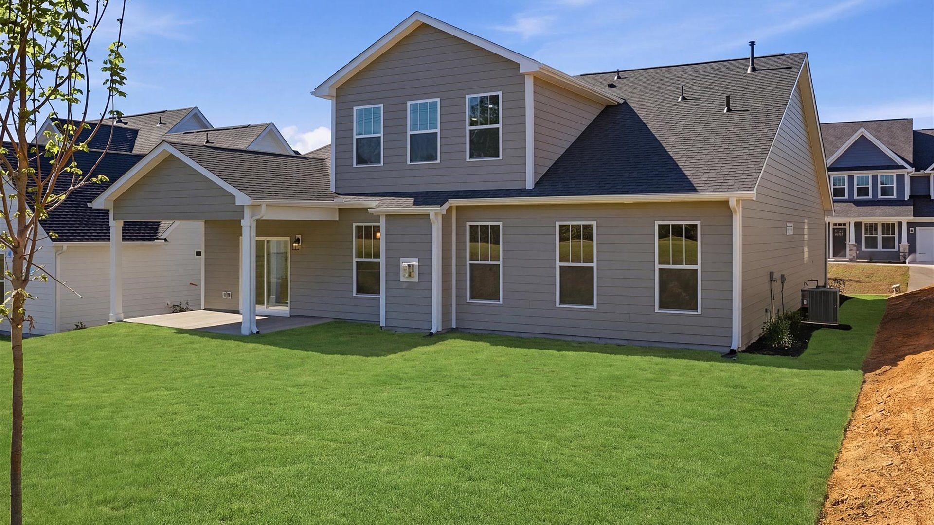 Highly functional rear covered porch adds memorable living space to this elegant home located in the reputable Woodruff, SC
