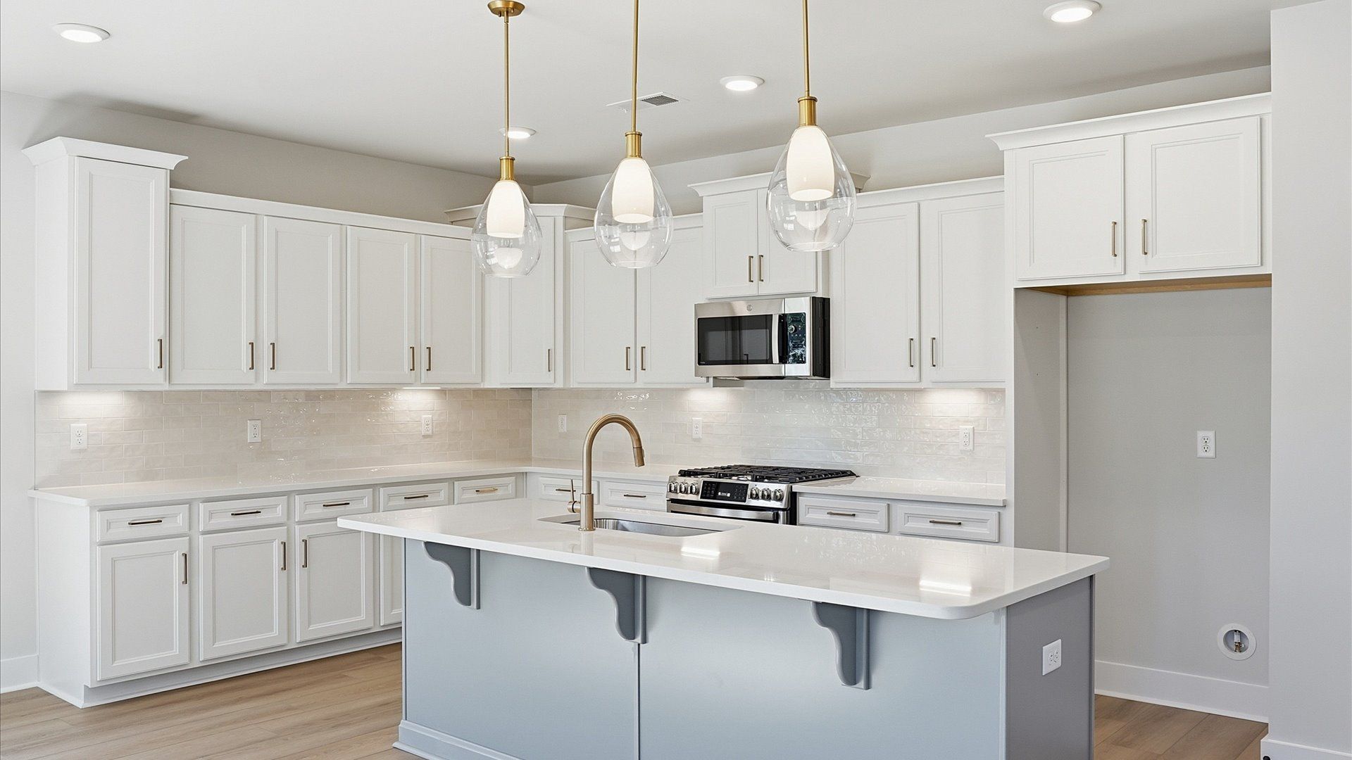 Elegant and center island anchors this tasteful kitchen with high standards and timeless appeal at Benjamin's Grove