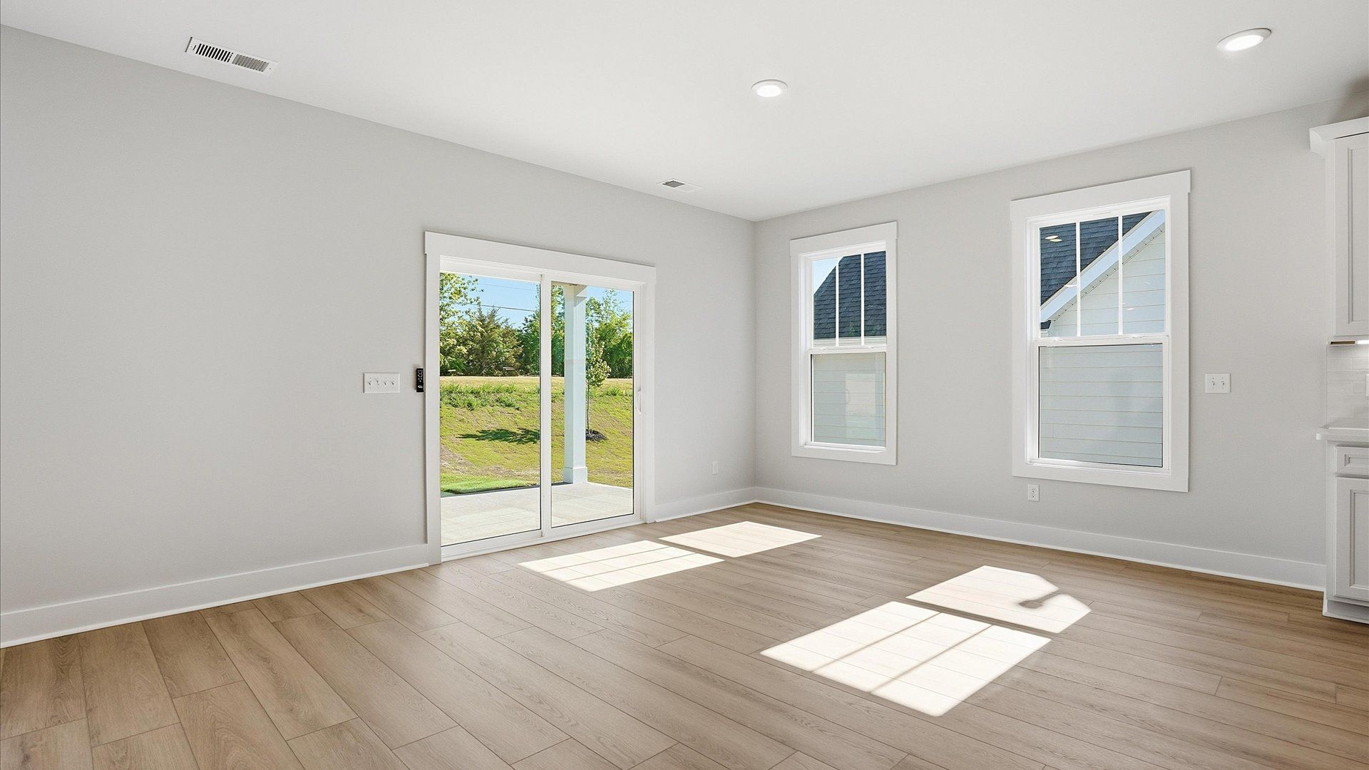 This casual dining area features a seamless layout that makes mornings feel easy and welcoming at Benjamin's Grove