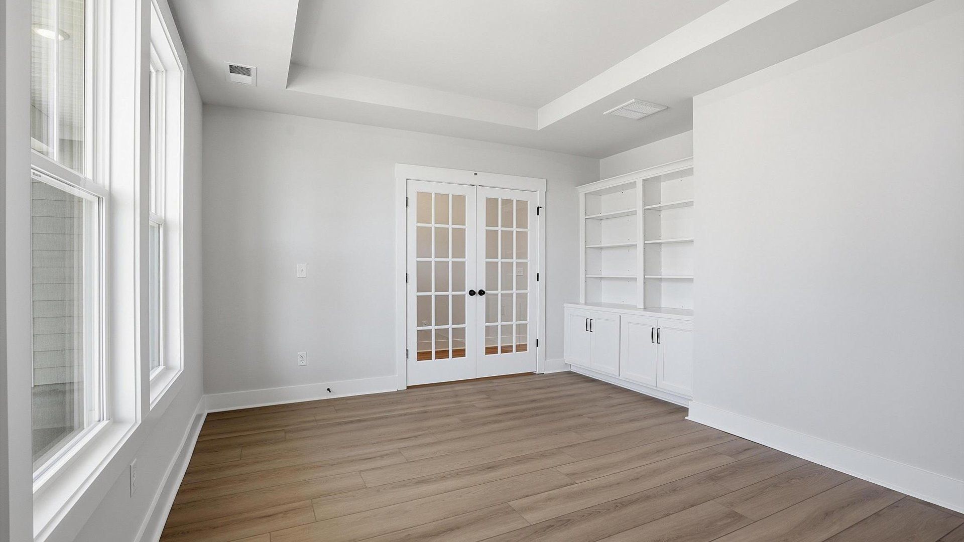 Refined and quiet study behind French doors—perfect for focused work or peaceful retreat located in Woodruff, SC