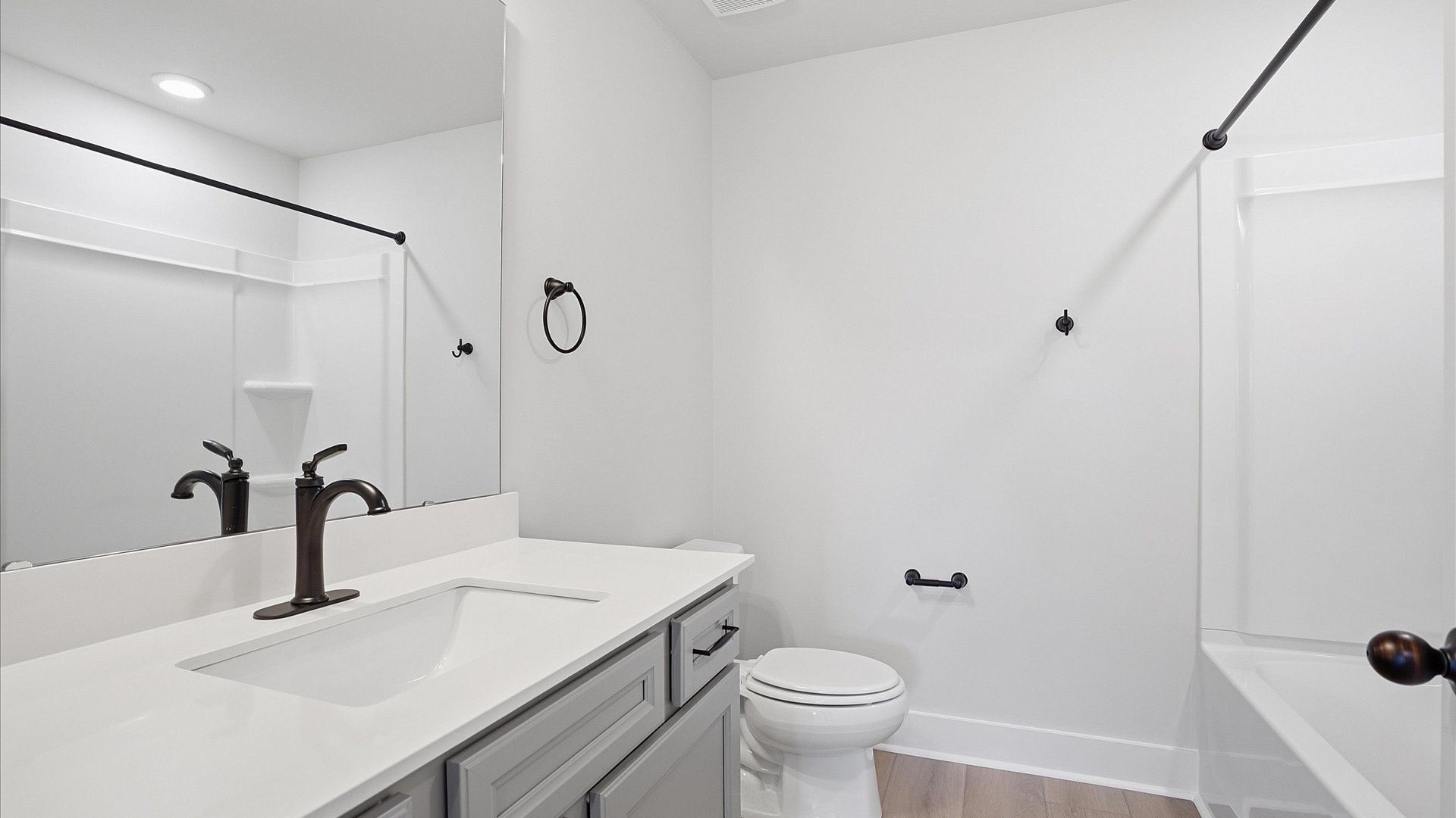 Accomplished full bath designed with both comfort and sophistication in mind located at Benjamin's Grove