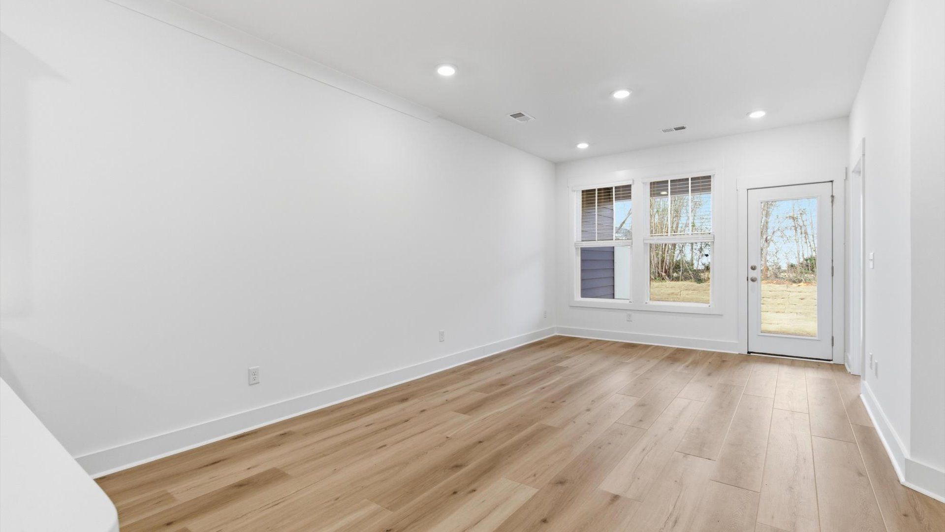 First-rate family room with thoughtful layout and superior connection to kitchen and dining spaces