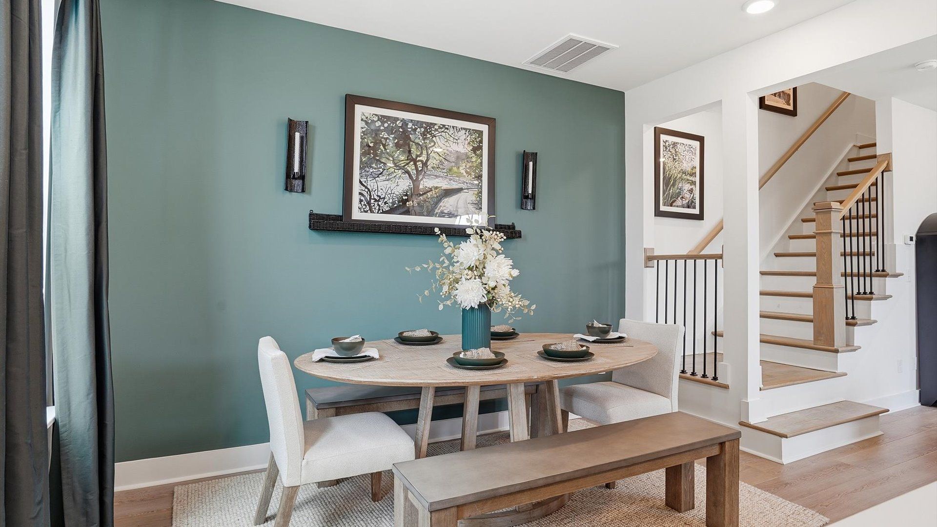 Memorable meals start in this exclusive dining space featuring elegant trim and natural light at Anna's Pointe
