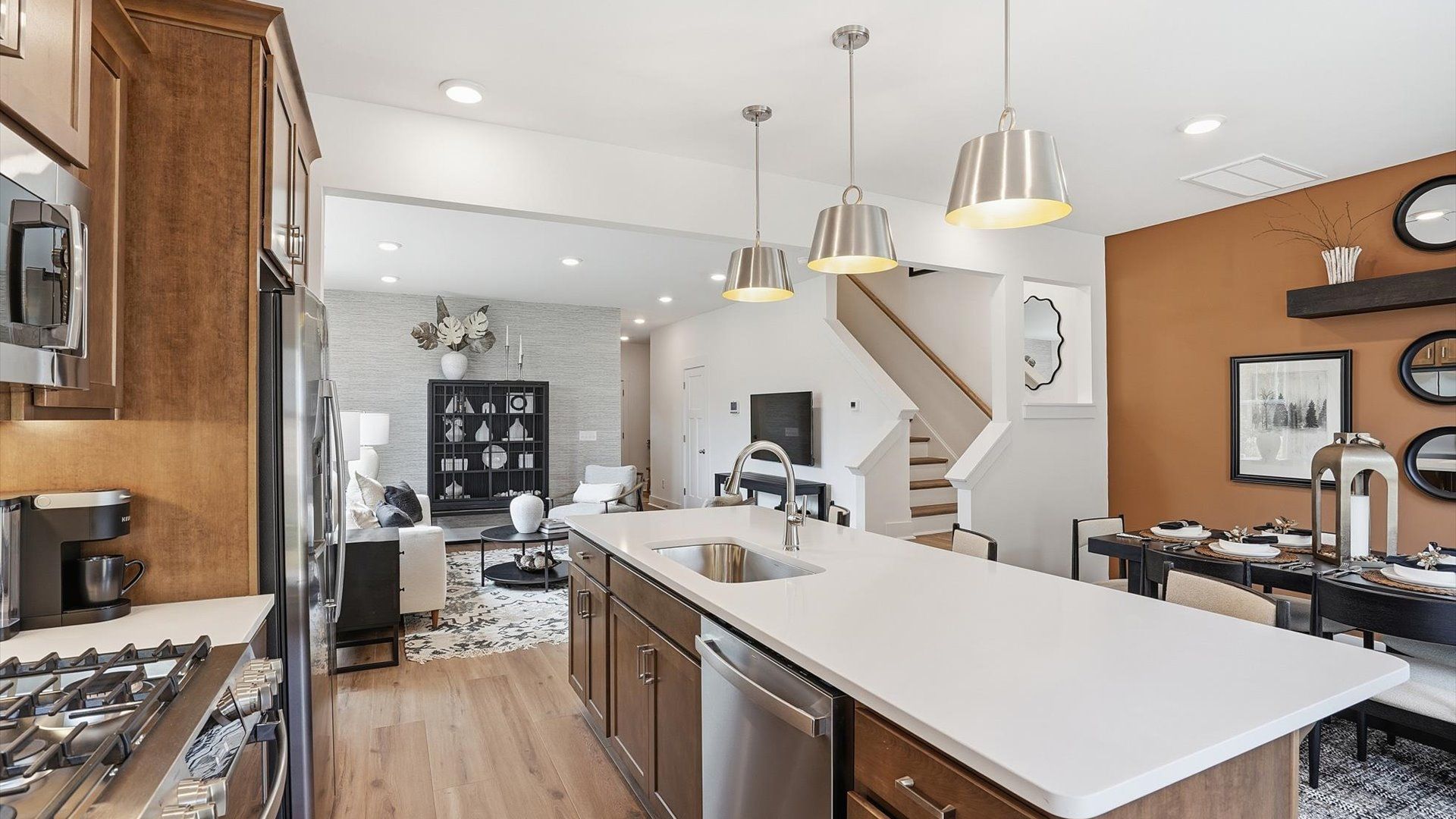 First-class finishes and a thoughtfully scaled island highlight this elegant kitchen space located in Greenville, SC