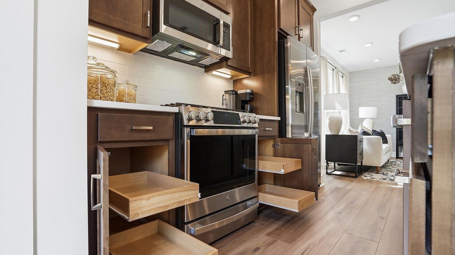 Vibrant kitchen layout with abundant storage, refined finishes, and open-concept flow located at Marion Square