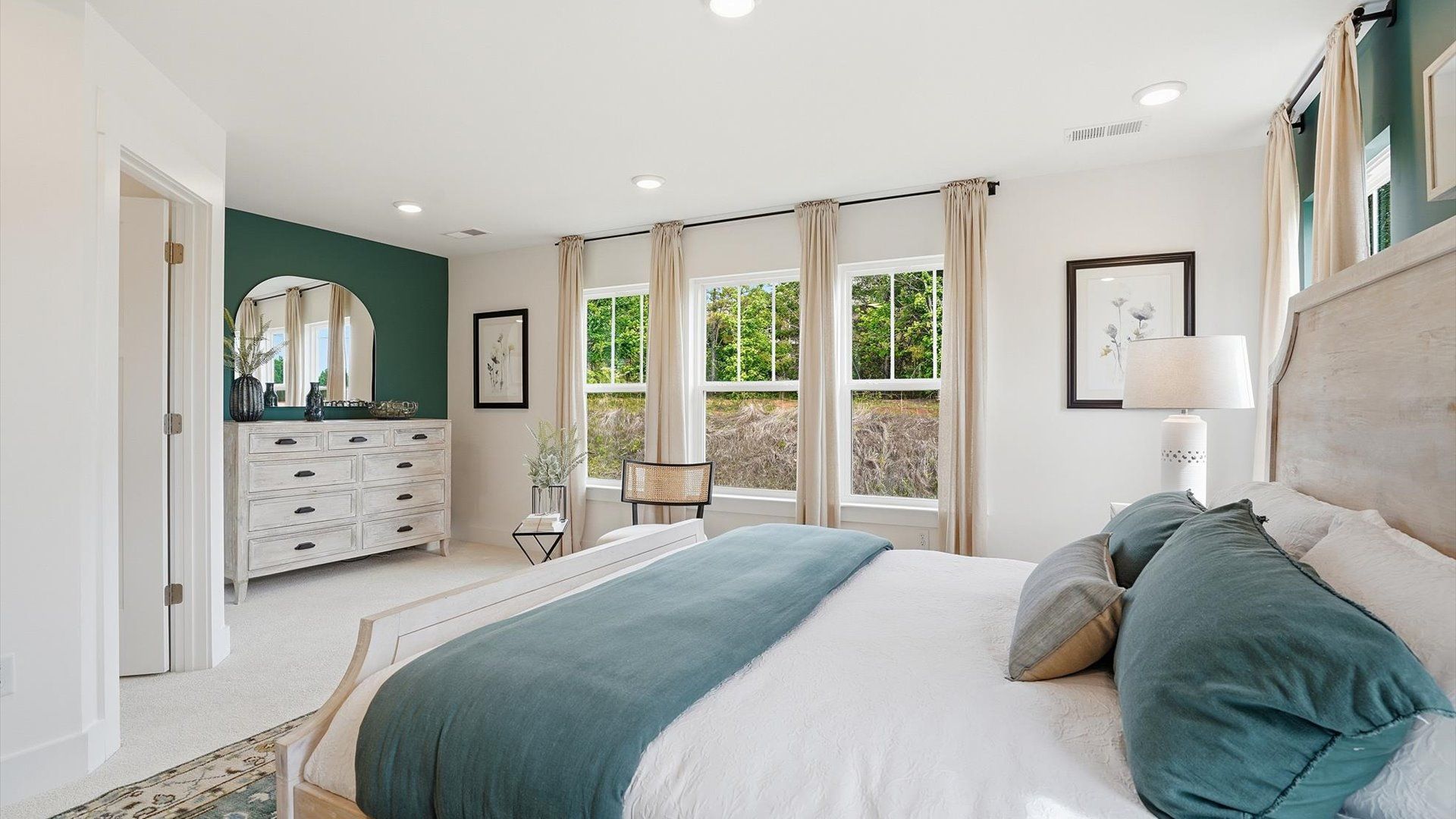 Accomplished design meets restful elegance in this exclusive upstairs primary suite by DRB Homes