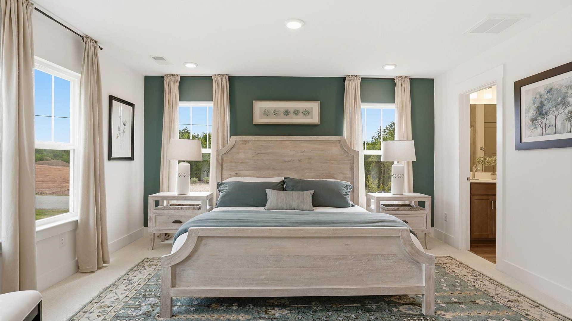 Memorable mornings begin in this tasteful and thoughtfully crafted primary suite located in Greenville, SC