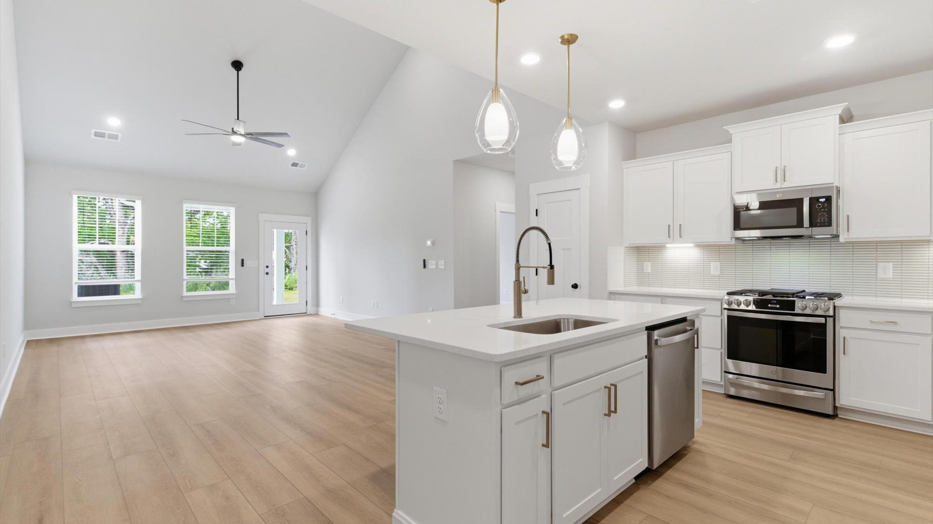 Accomplished design in a kitchen that blends function and form with a right-sized island located in Anderson, SC