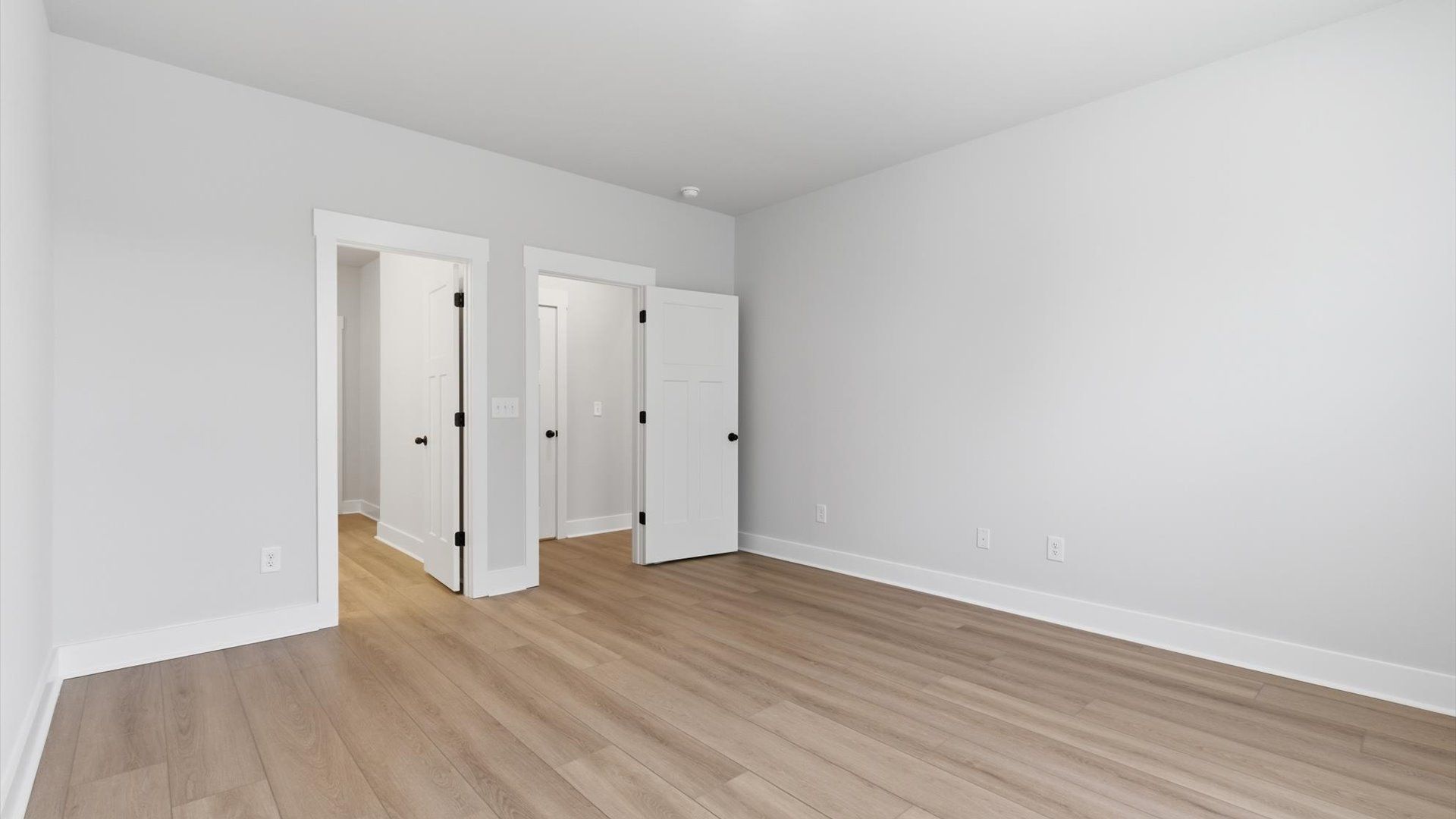 Accomplished primary retreat with eye-catching hardwood flooring in a desirable Anderson community