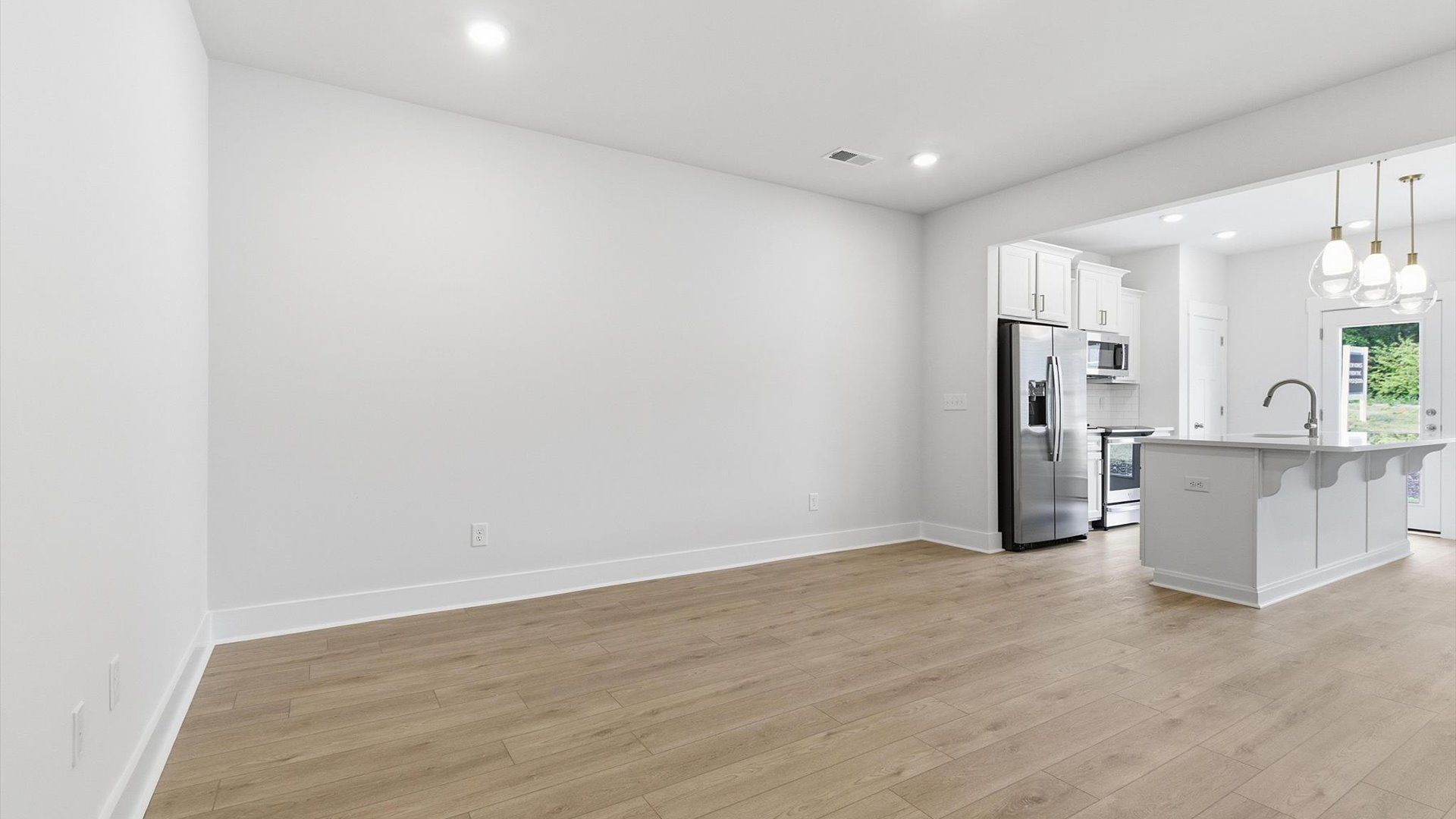 Notable family room designed with high standards—perfect for both everyday living and entertaining at Gresham Station