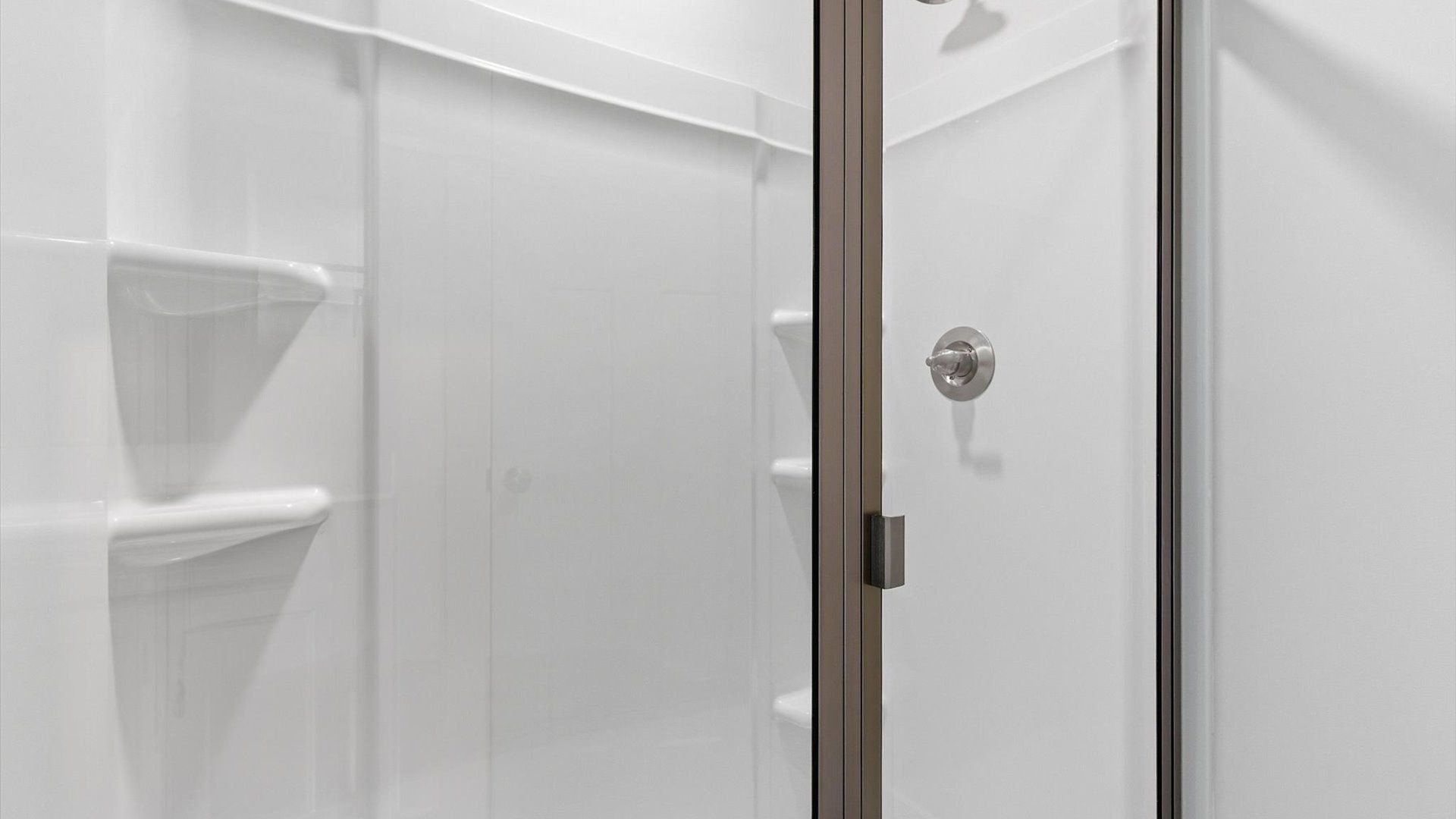 First-rate primary bathroom offering an elegant walk-in shower and superior style located near Downtown Simpsonville