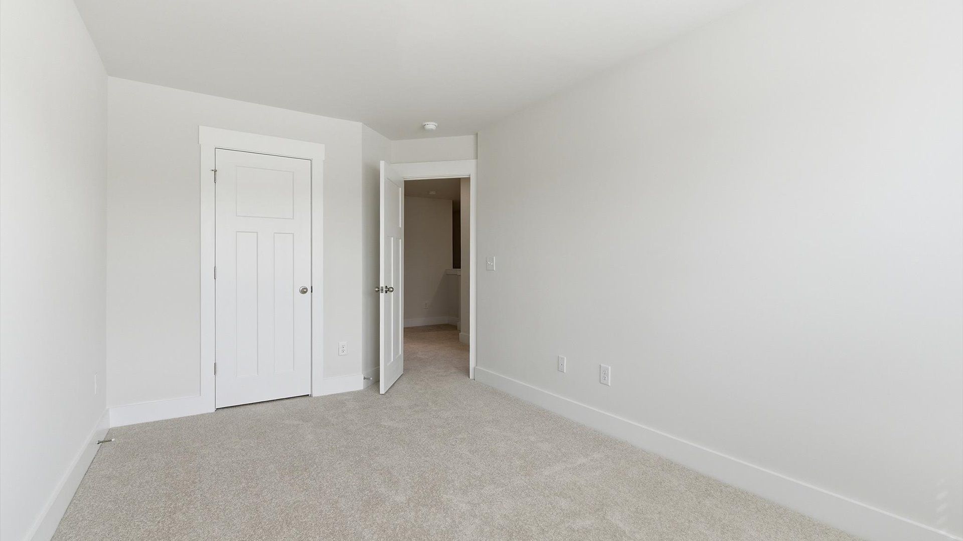 Superior comfort in a secondary bedroom with plush carpet and an oversized walk-in closet at Gresham Station