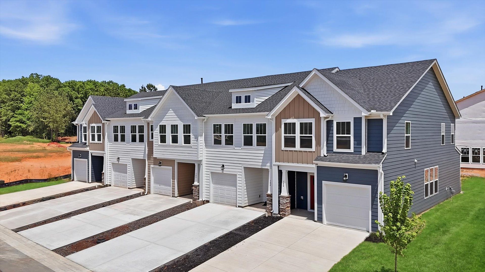 Eye-catching exterior with timeless color palette and superior architectural detail at the Barton Hollow community