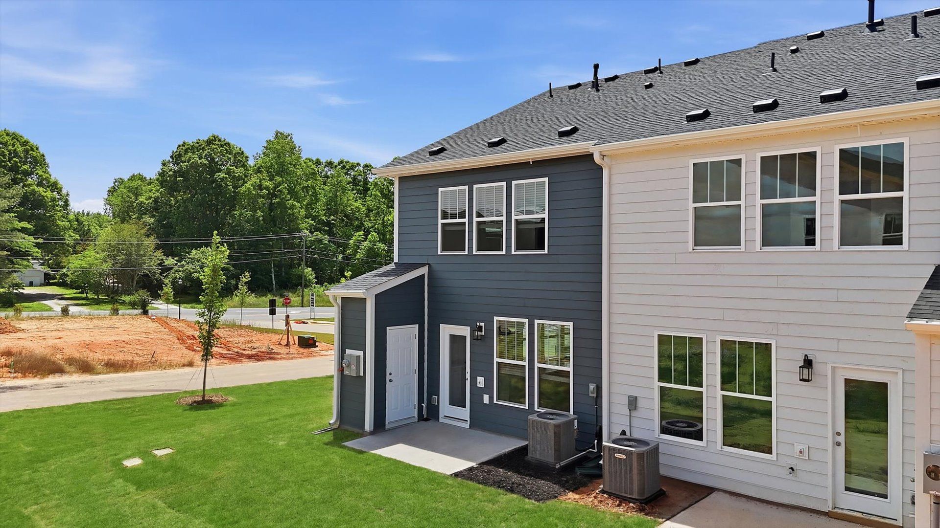 Notable exterior includes a rear patio designed for year-round enjoyment located at Barton Hollow