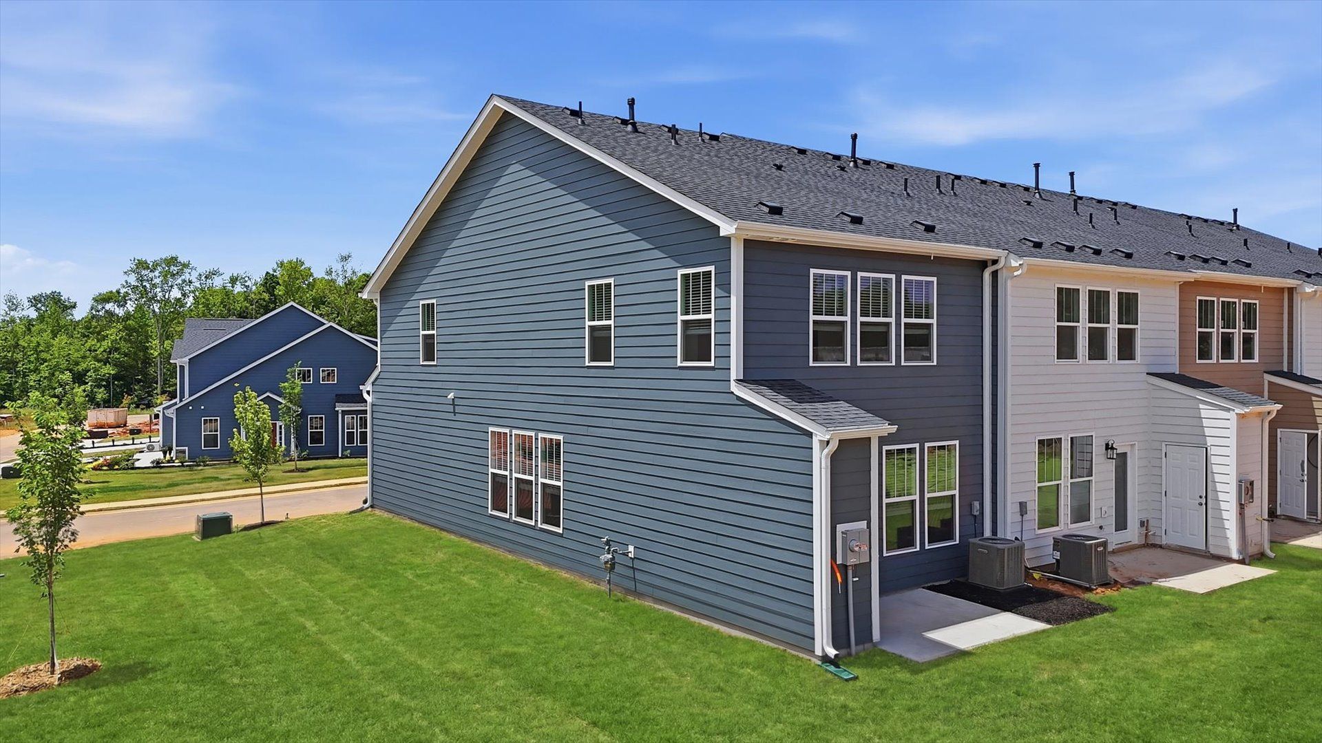 Superior curb appeal continues to the back with a refined, spacious outdoor living space at Barton Hollow