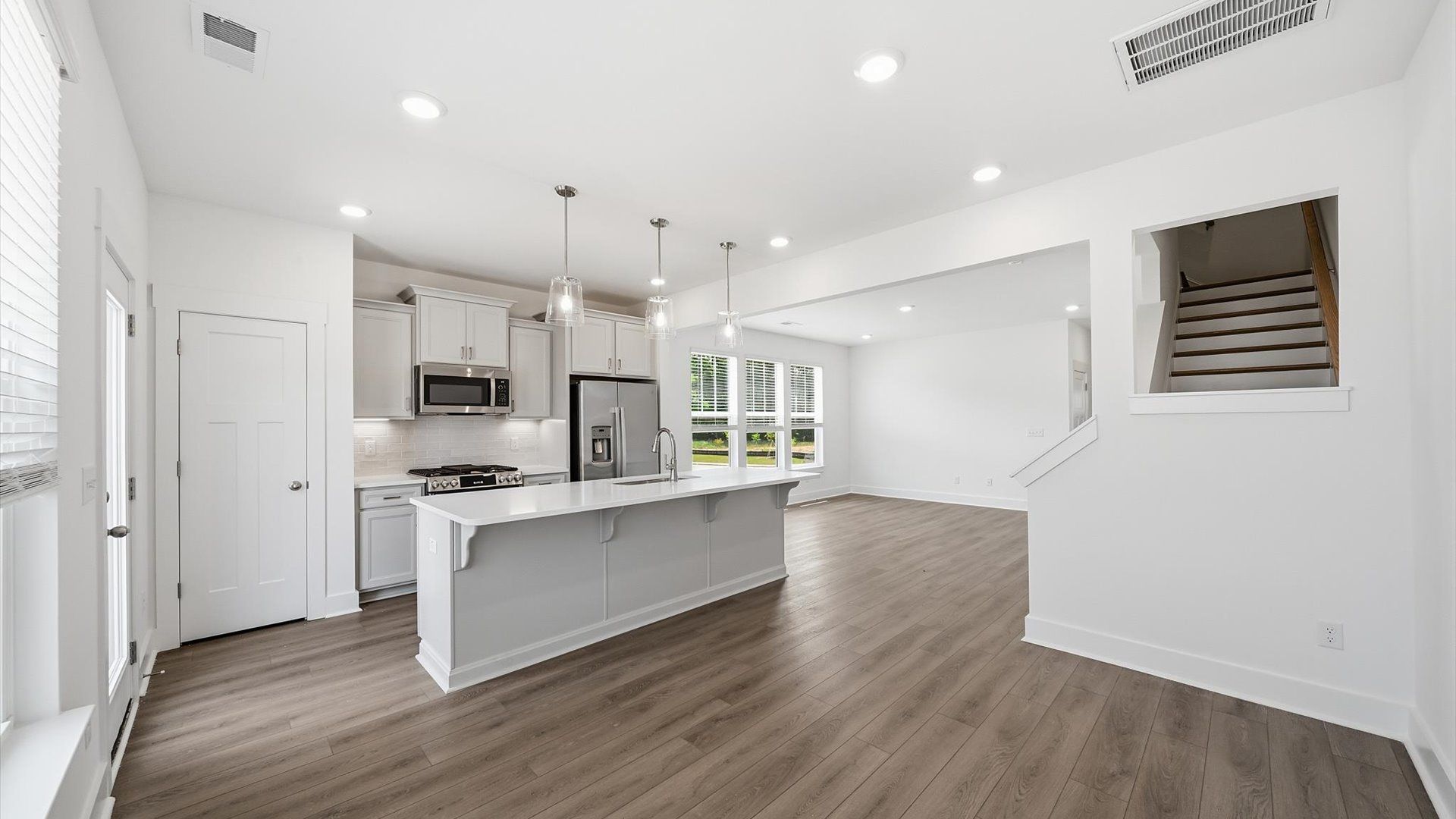 This casual dining area features a seamless layout that makes mornings feel easy and welcoming