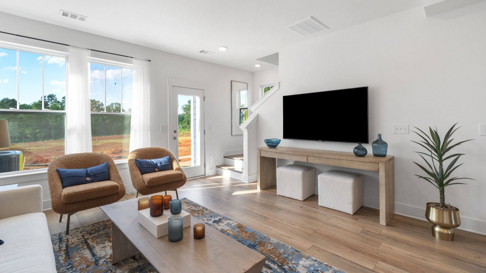Exclusive living space with tasteful touches, natural light, and a vibrant open-concept feel of The Churchill Design