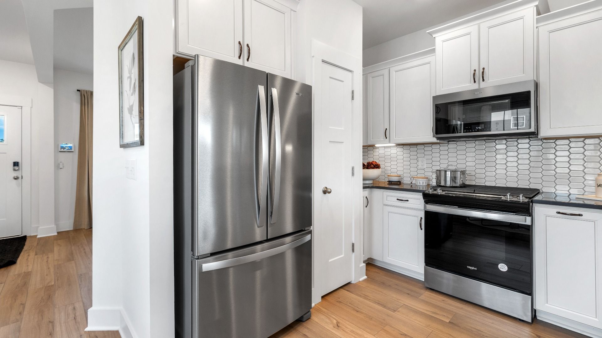 Exclusive DRB Homes kitchen with a stainless steel appliances and elevated finishes in a prime location