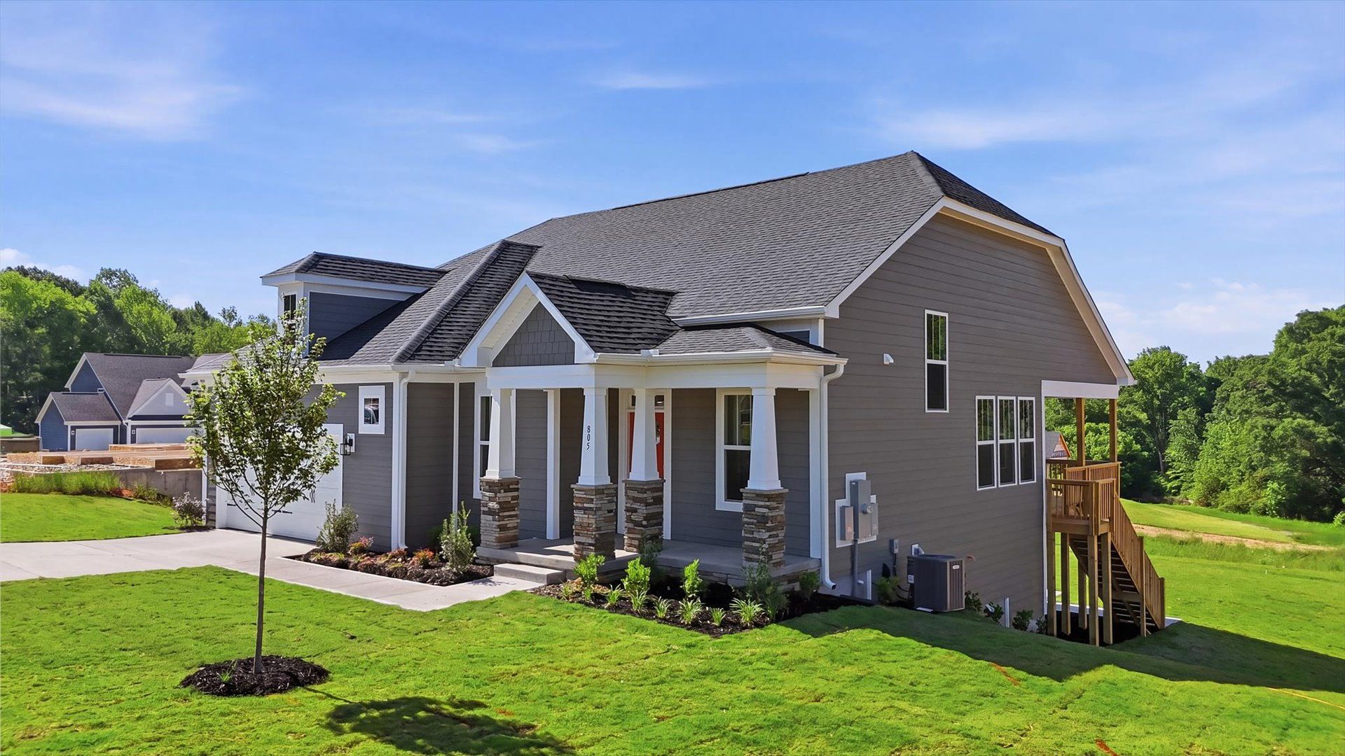 Refined exterior design with balanced architectural detail in this distinguished two-story home at Pinebrook