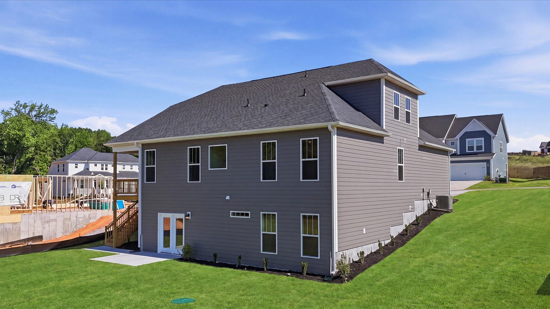 Established charm meets functional outdoor living with a spacious rear covered porch and deck at Pinebrook