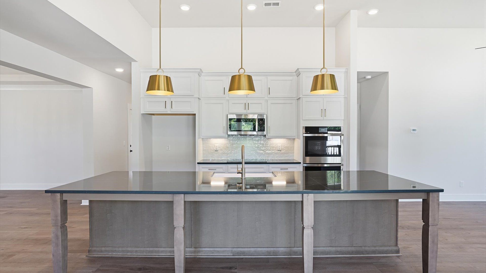 Well-designed kitchen with a center island and tasteful finishes that elevate everyday living at the Pinebrook community