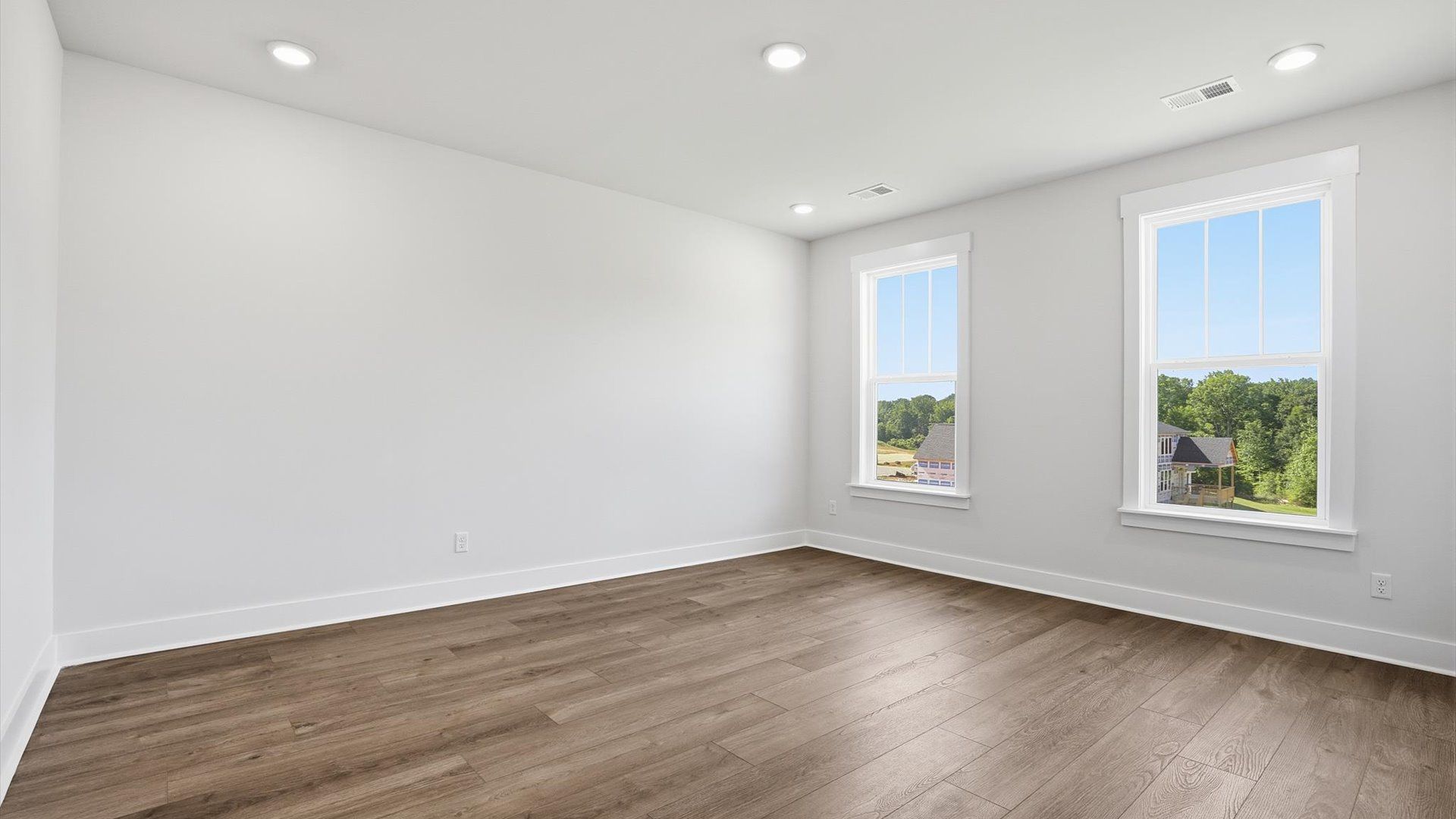 Spacious and serene primary suite with thoughtful design in a desirable DRB Homes community