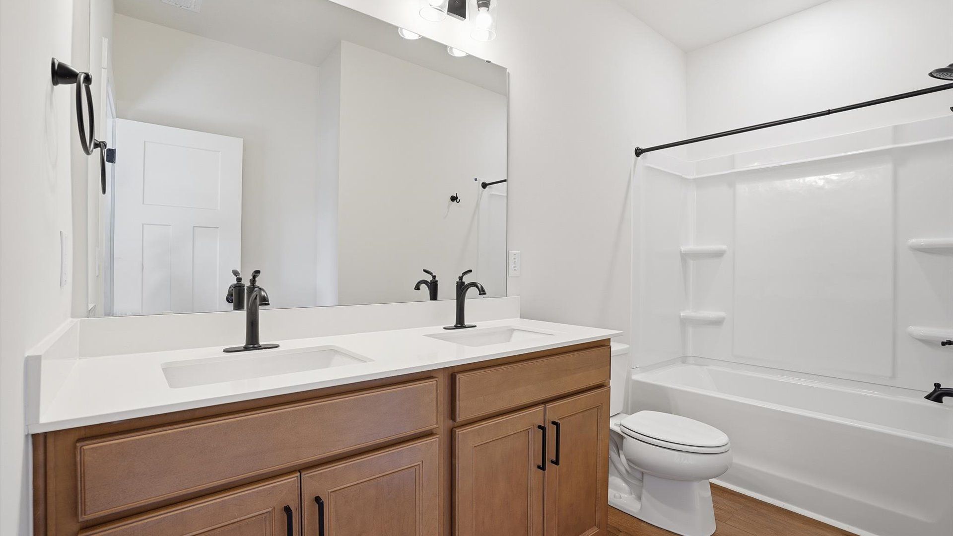 Accomplished full bath designed with both comfort and sophistication in mind