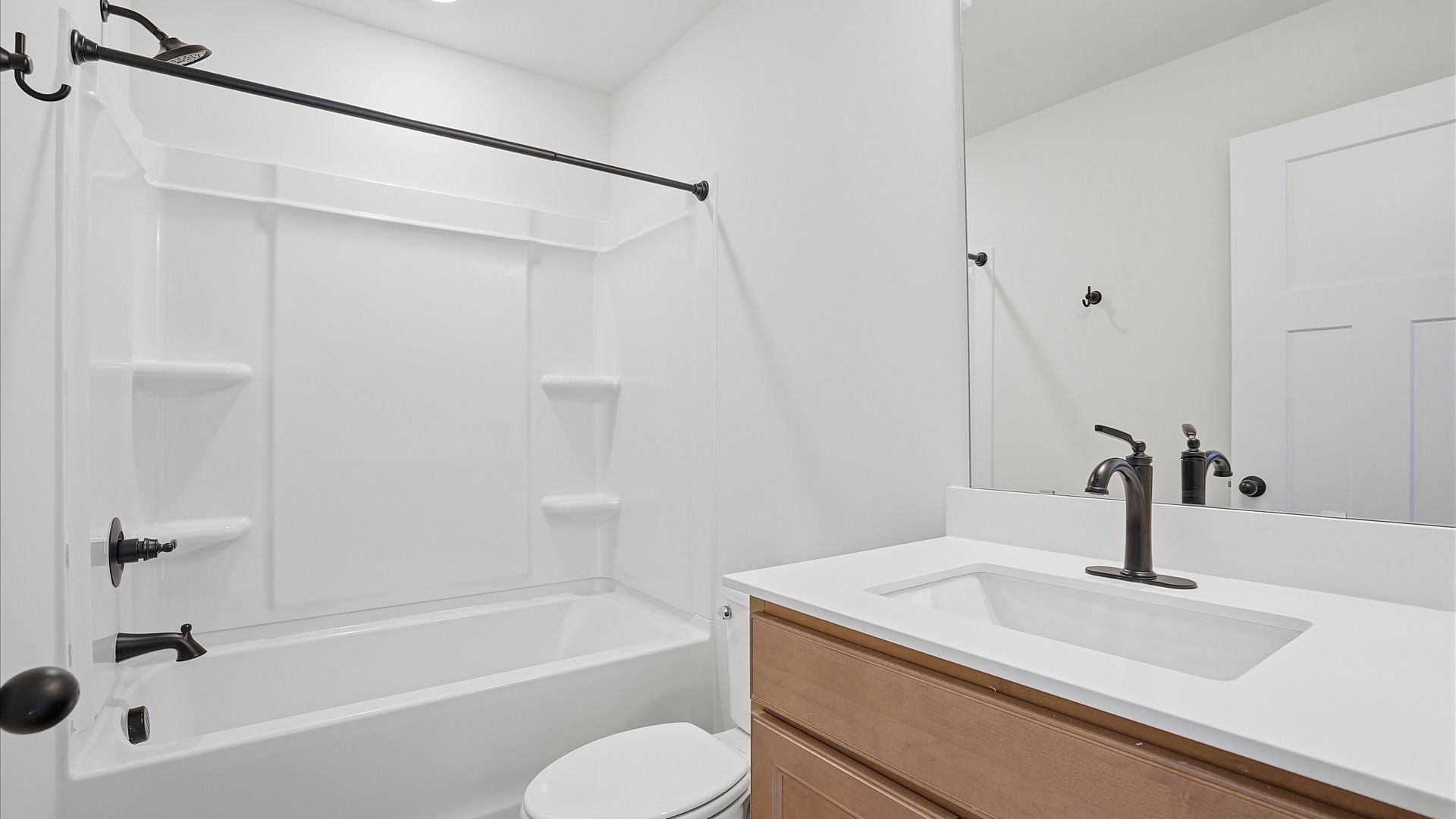 Well-appointed full bath with high standards of craftsmanship and everyday function located at Pinebrook
