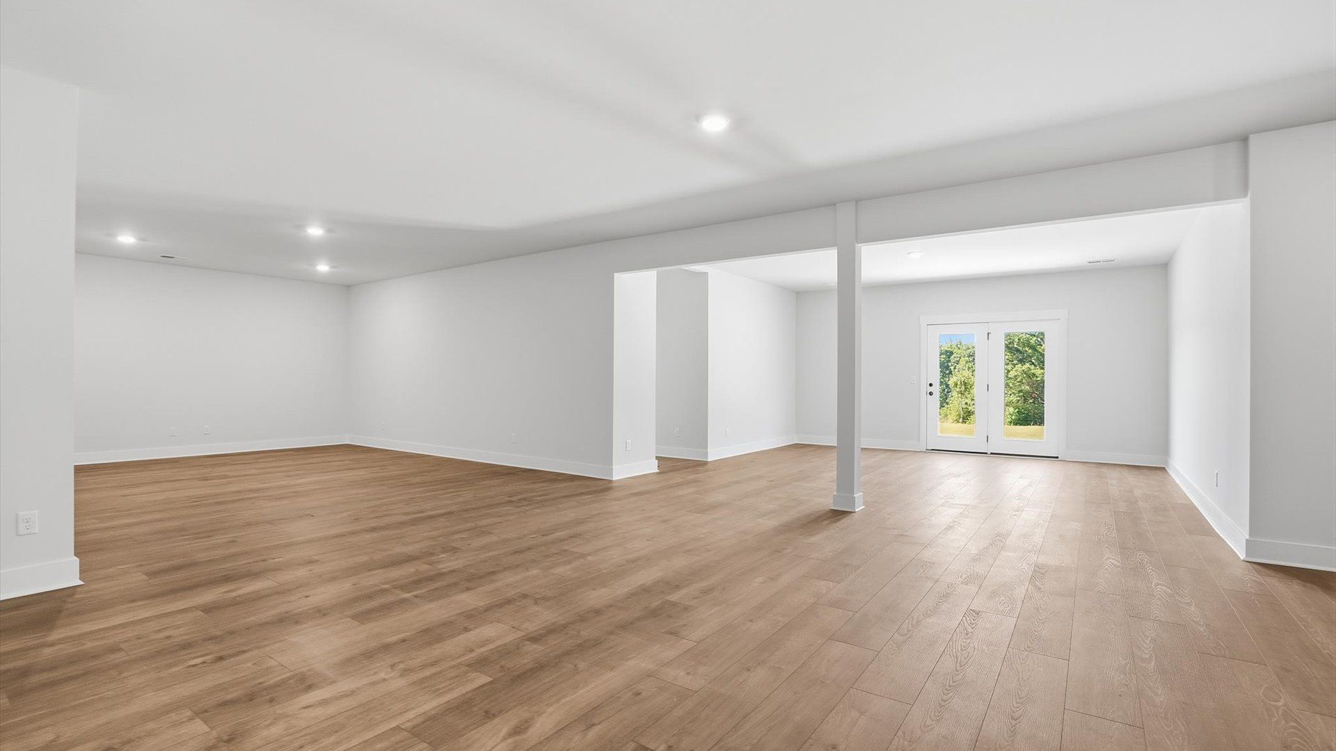 Relaxed basement retreat featuring comfortable space for entertainment and leisure located in the growing Woodruff, SC