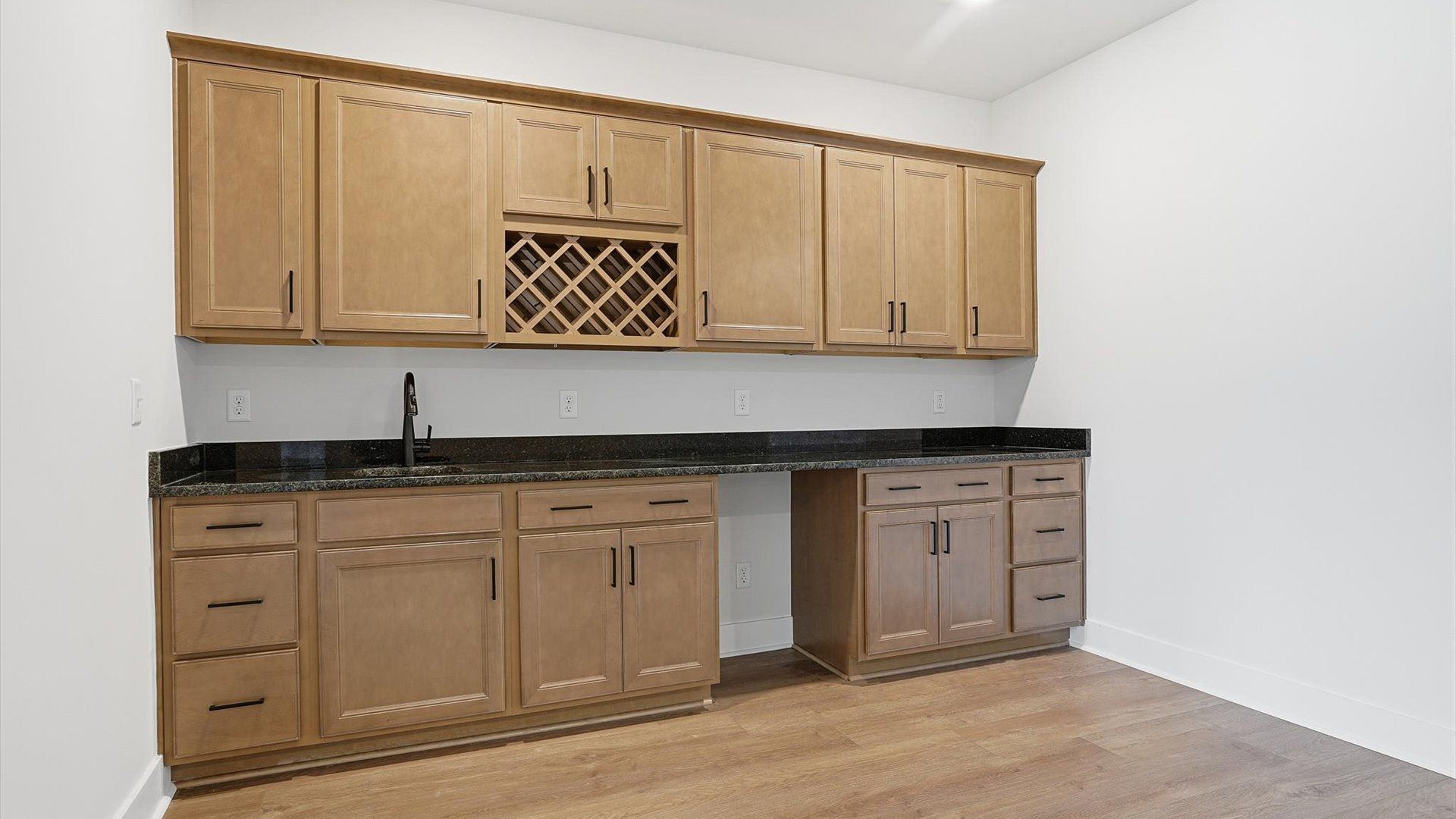 Sleek and functional basement kitchenette with versatile everyday use located in Woodruff, SC