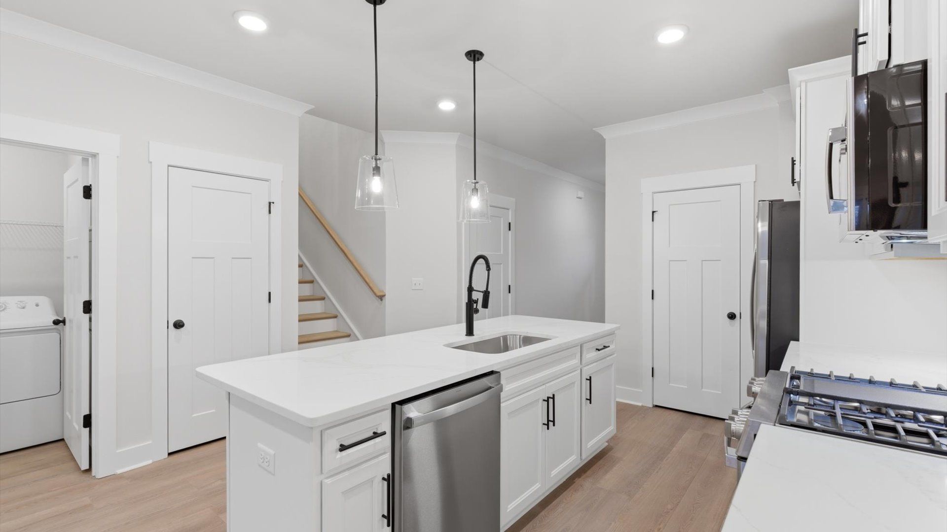 First-class finishes and a thoughtfully scaled island highlight this elegant kitchen space located in Greenville, SC
