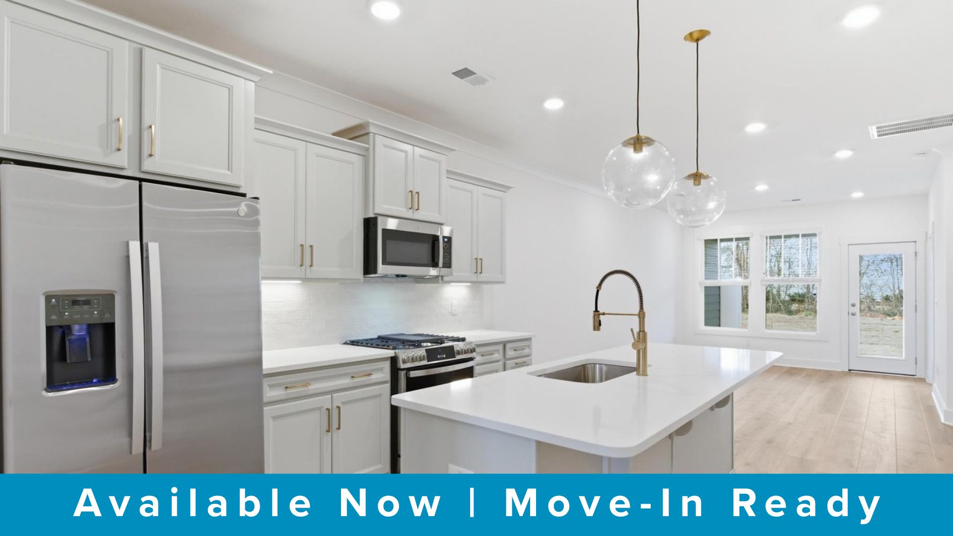 First-rate kitchen with functional layout, designer pendant lighting, and a large center island