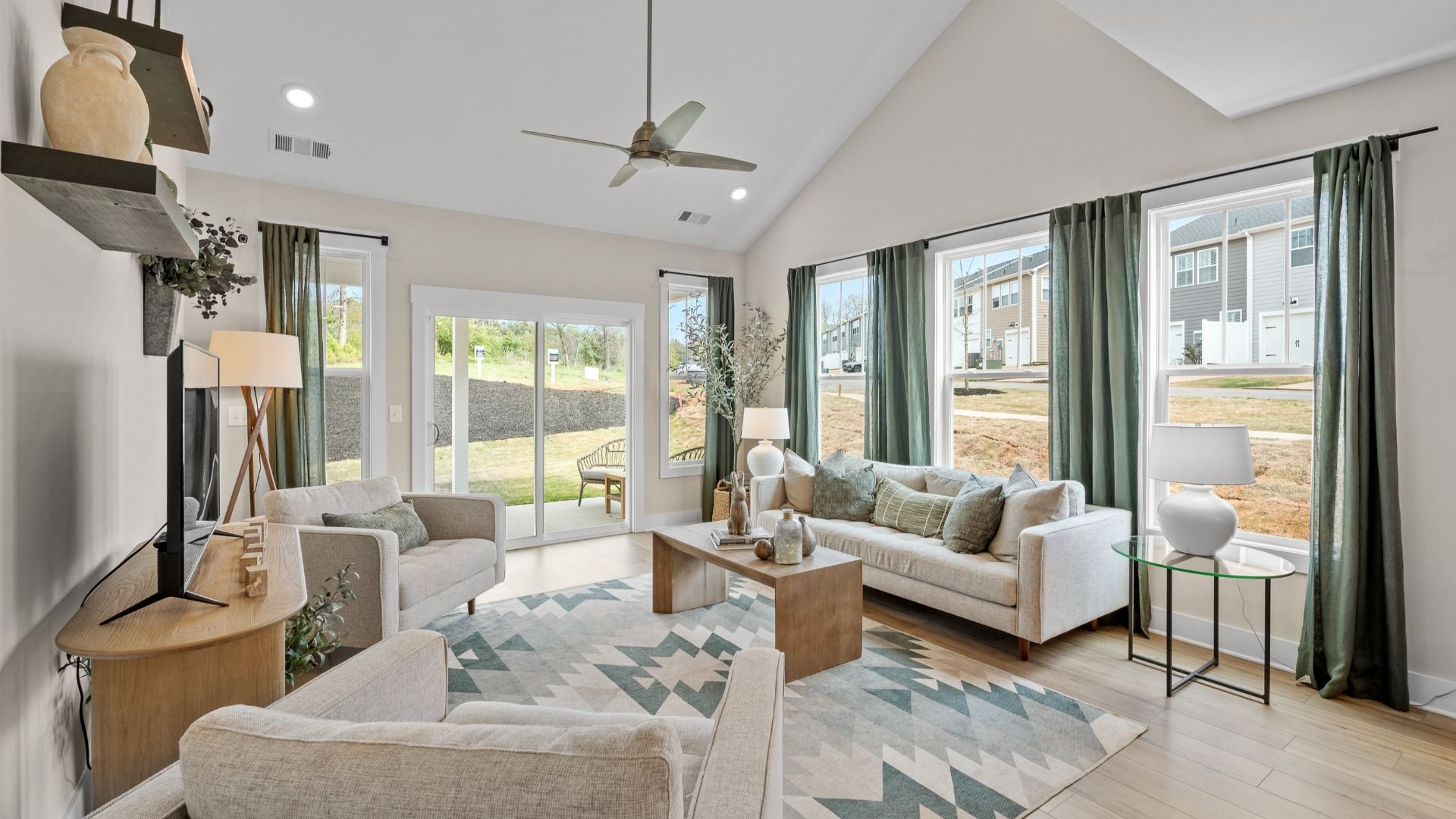 Hardwood flooring and high standards define this vibrant family room ideal for everyday living located in Fountain Inn, SC