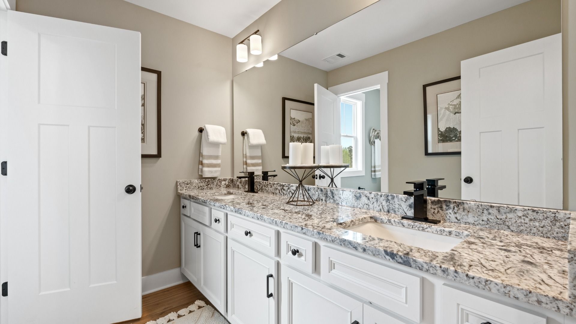 Top-notch bathroom with current fixtures, tasteful materials, and elevated charm in Fountain Inn, SC