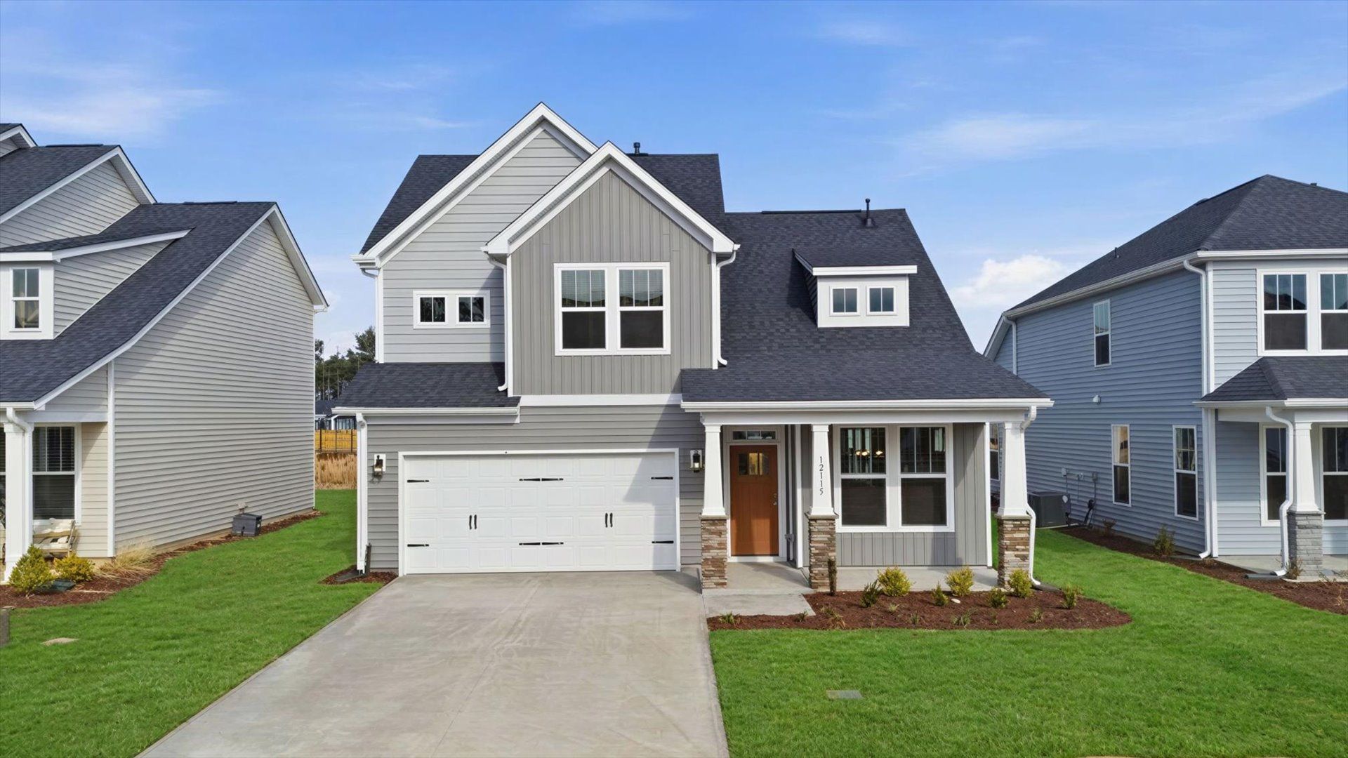 Refined exterior design with balanced architectural detail in this distinguished two-story home at Barton Hollow