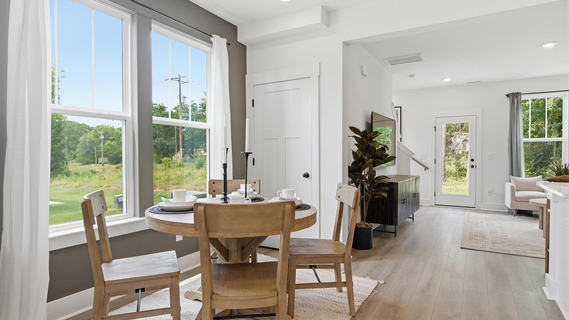 This casual dining area of the Churchill Design features a seamless layout that makes meals feel easy and welcoming