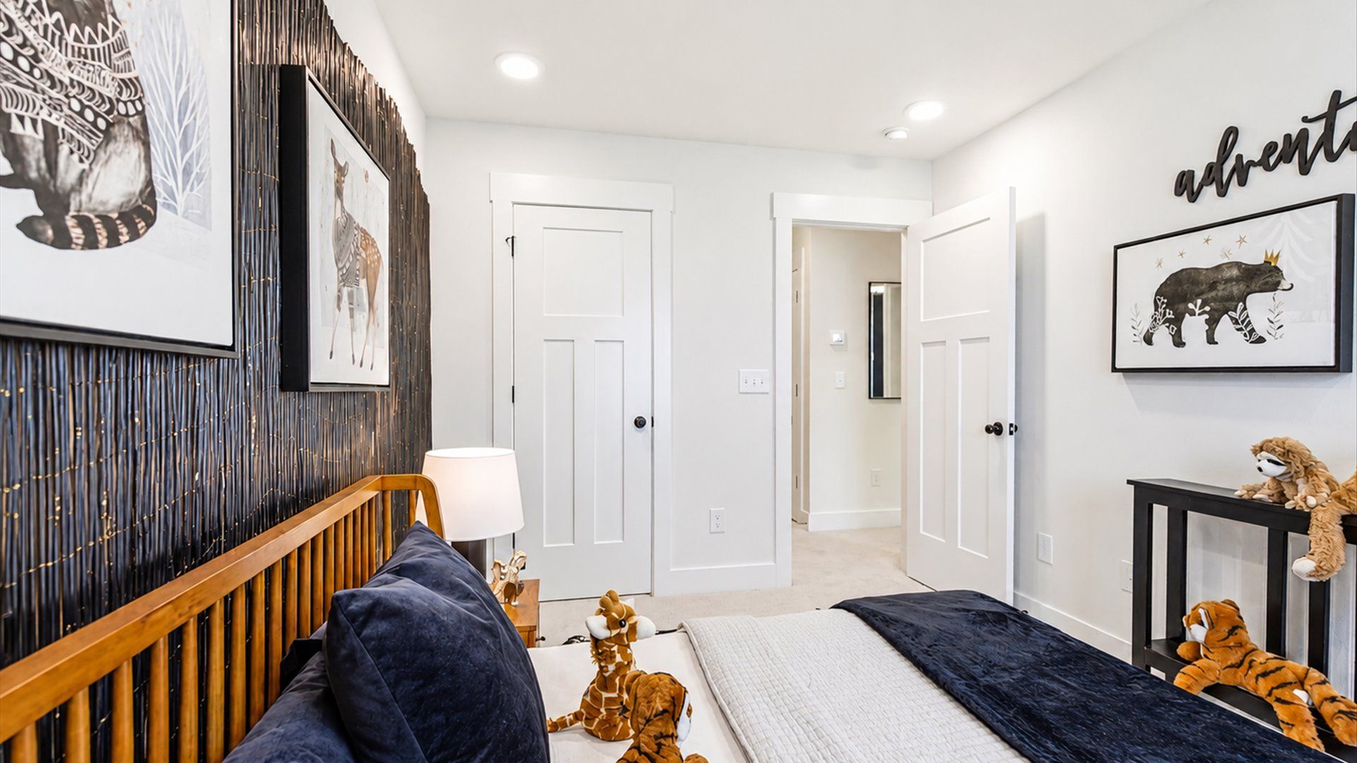 Memorable space offering plush carpet underfoot and a thoughtfully planned walk-in closet at the Churchill Design