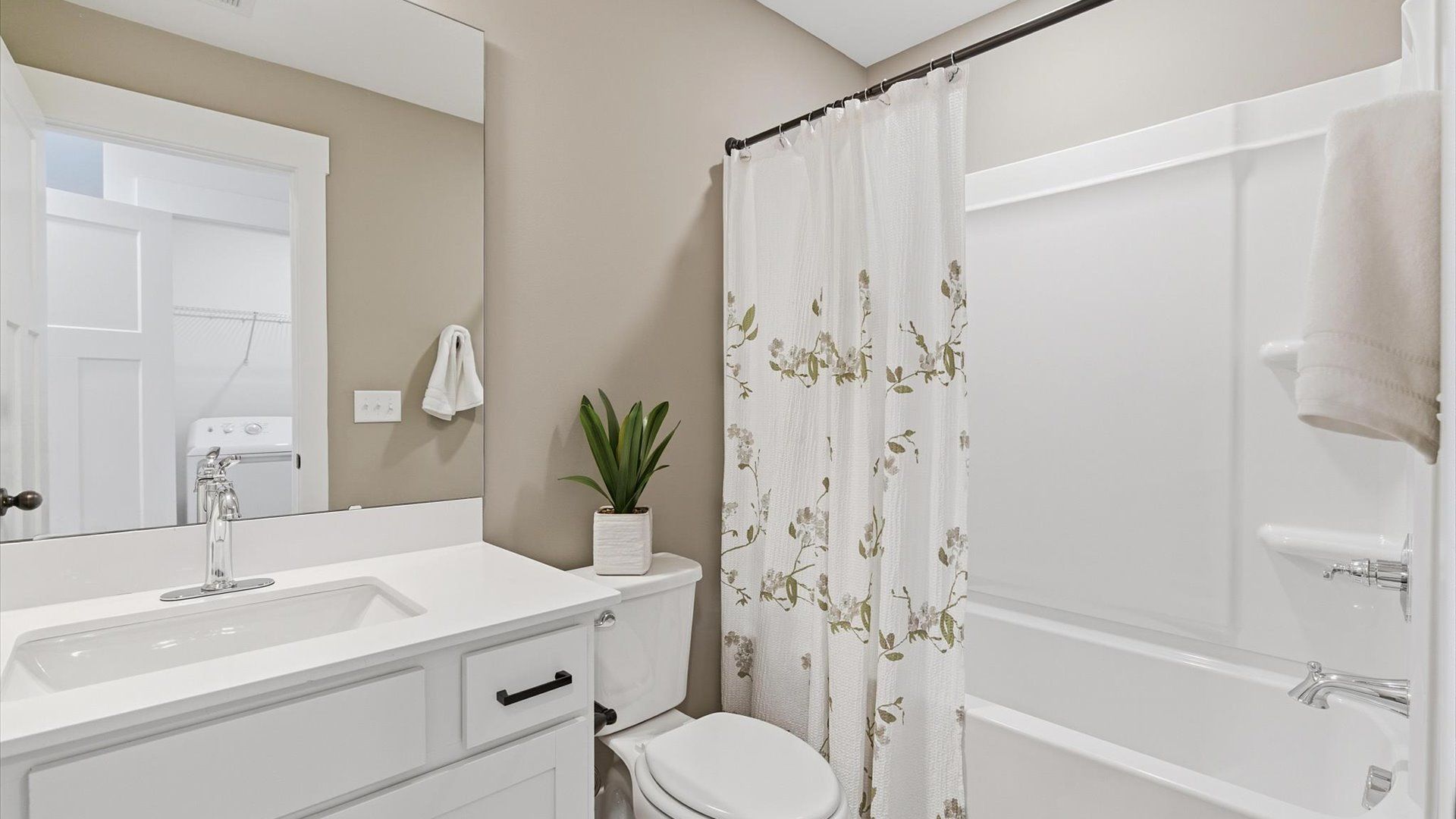 Churchill Design secondary bathroom with clean lines, contemporary lighting, and timeless style