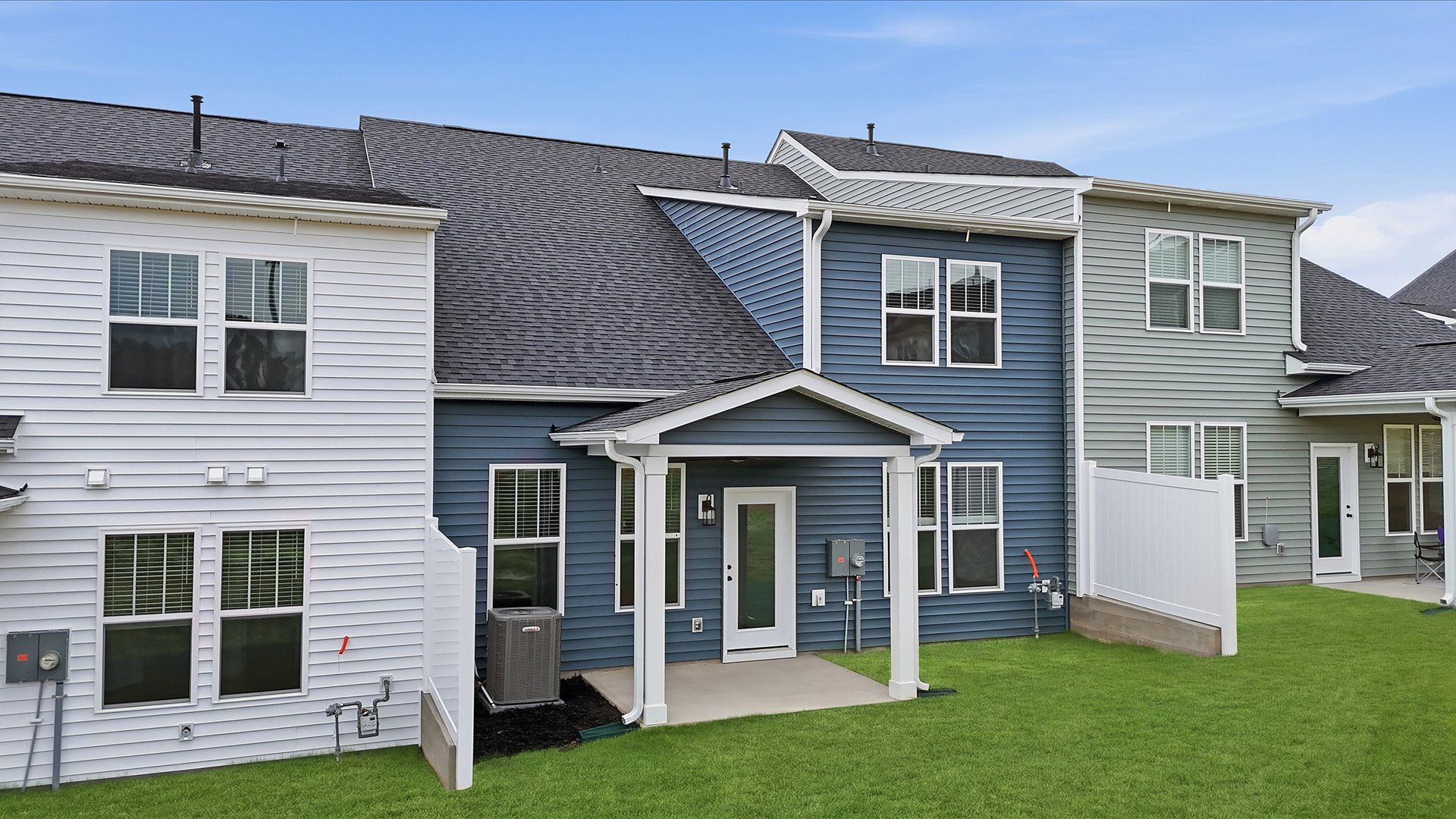 Notable exterior includes a rear covered porch designed for year-round enjoyment at the Silo Ridge community